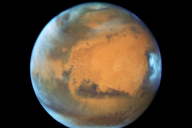 Mars’ missing atmosphere could be hiding in plain sight, scientists believe (ESA/Nasa/Hubble Space Telescope)