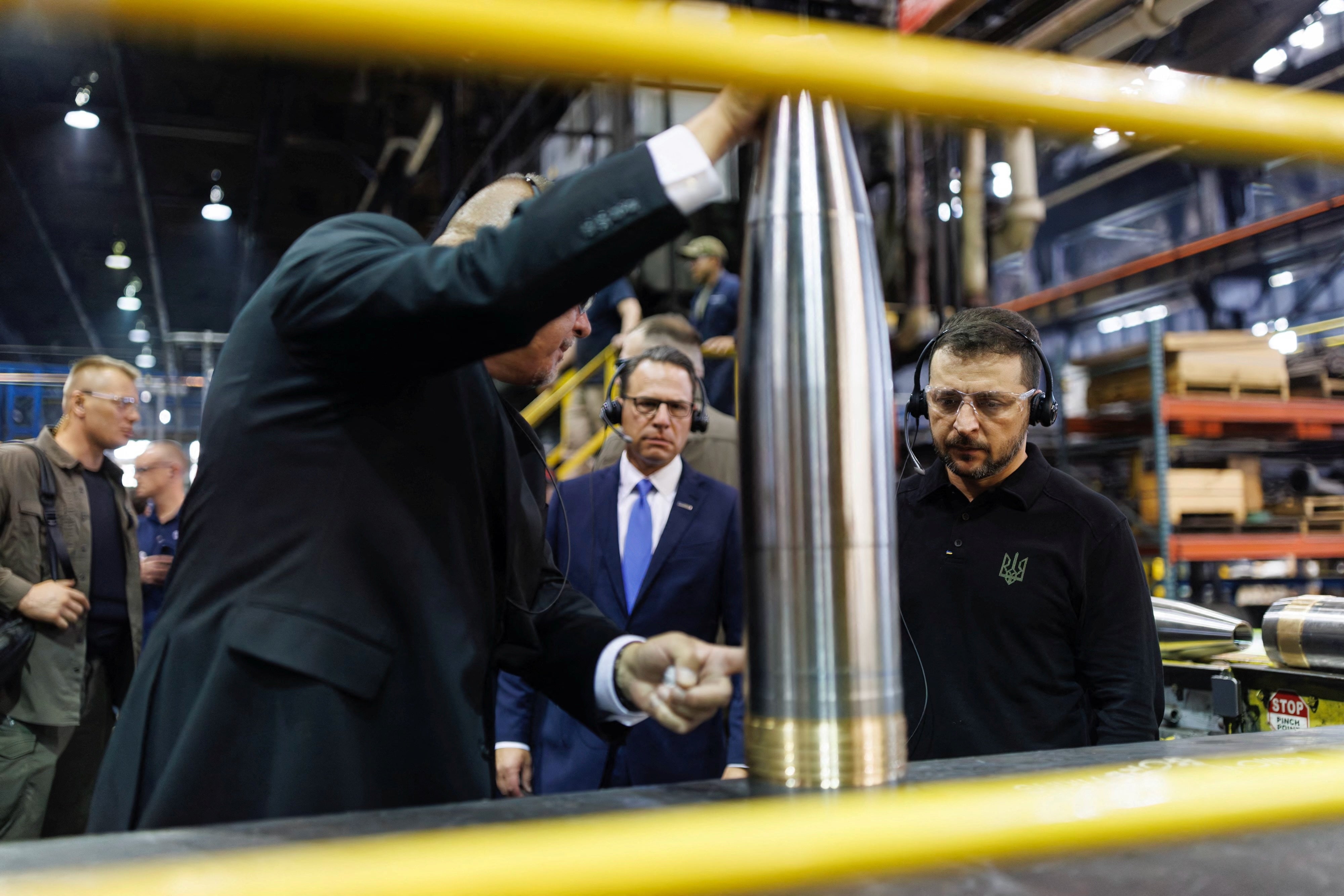 Ukraine's President Volodymyr Zelenskiy stands near Pennsylvania Governor Josh Shapiro during his visit to the Scranton Army Ammunition Plant in Scranton, Pennsylvania