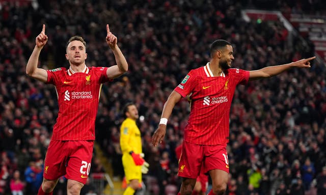 <p>Diogo Jota, left, celebrates scoring Liverpool’s second goal with teammate Cody Gakpo</p>