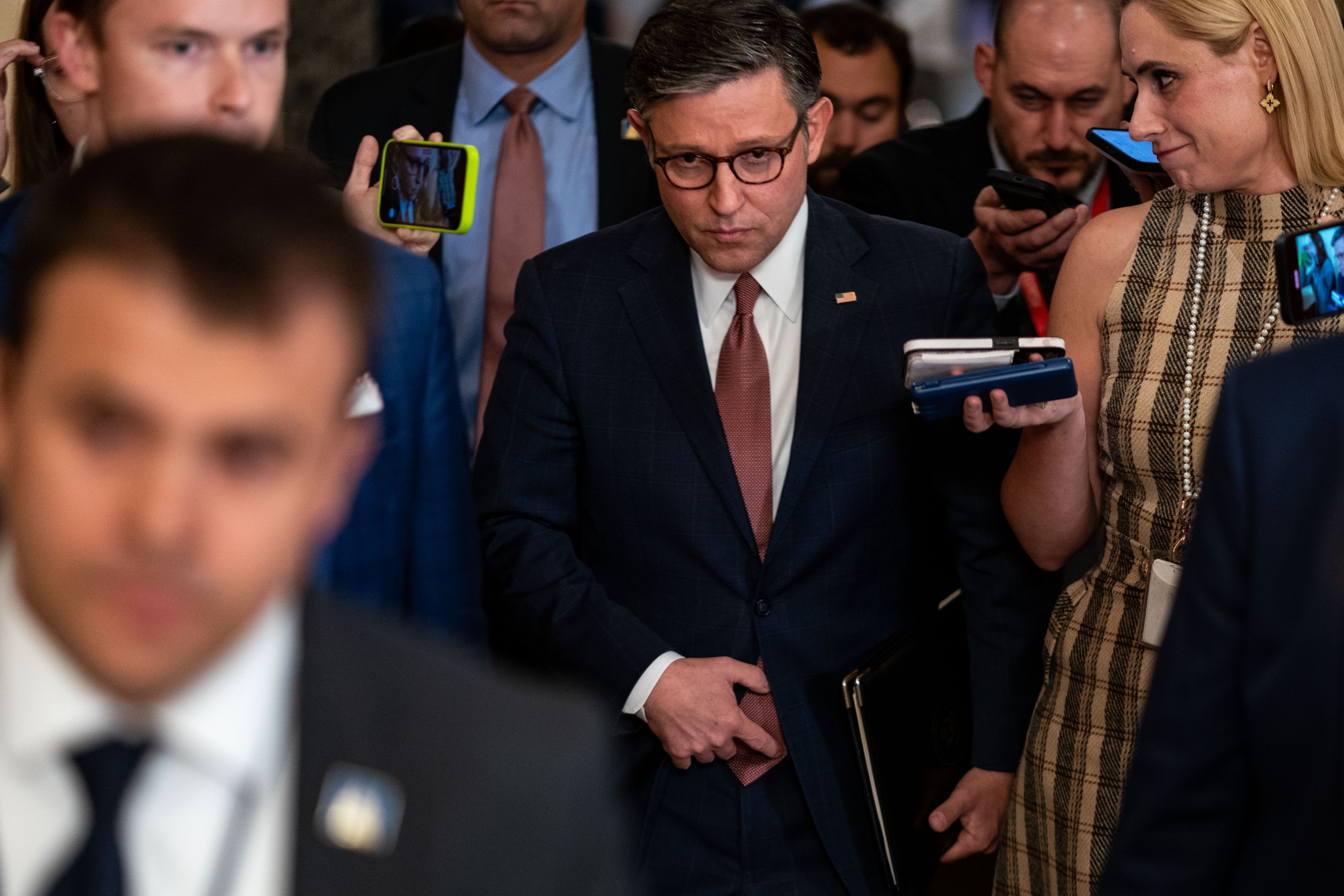 Speaker of the House Mike Johnson (R-LA) speaks with reporters as he walks from his office to the House Chamber at the U.S. Capitol on September 25, 2024