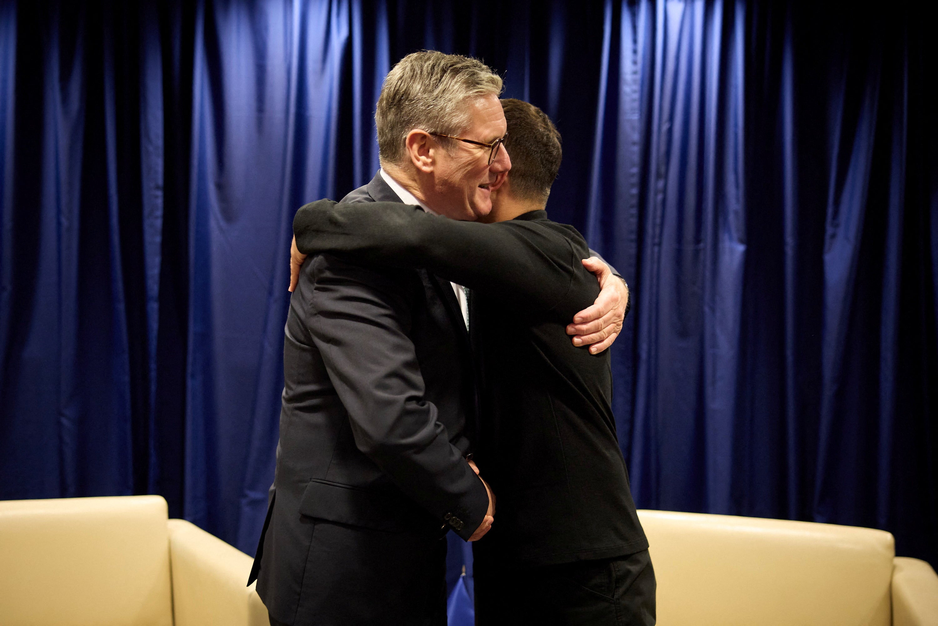 Ukraine's President Volodymyr Zelenskiy and Keir Starmer embrace each other before their meeting during the United Nations General Assembly summit in New York City