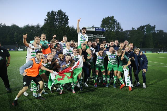 <p>The New Saints players celebrate victory in the Conference League play-off round against Panevezys</p>