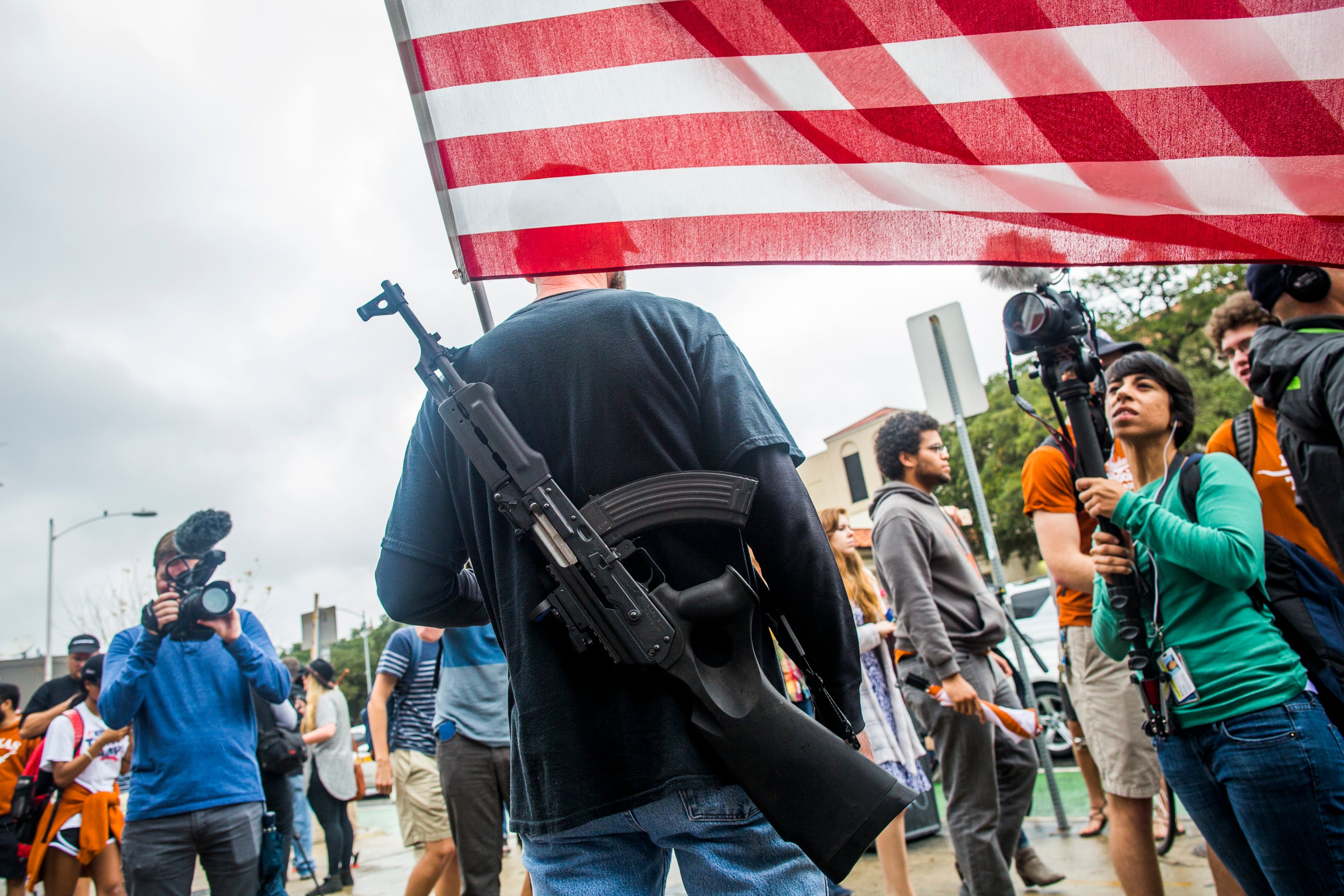 Gun activists take part in a rally near the University of Texas campus