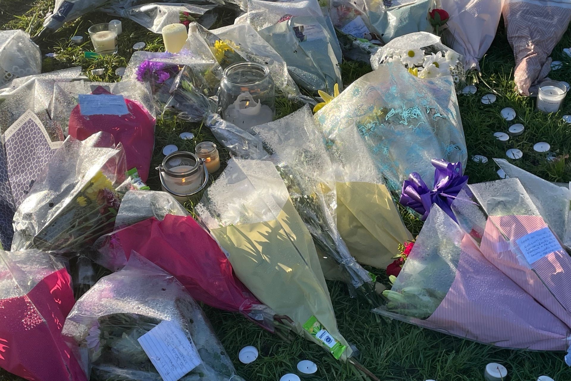 Floral tributes left at the scene in at Stowlawn playing fields in Wolverhampton where Shawn Seesahai was attacked