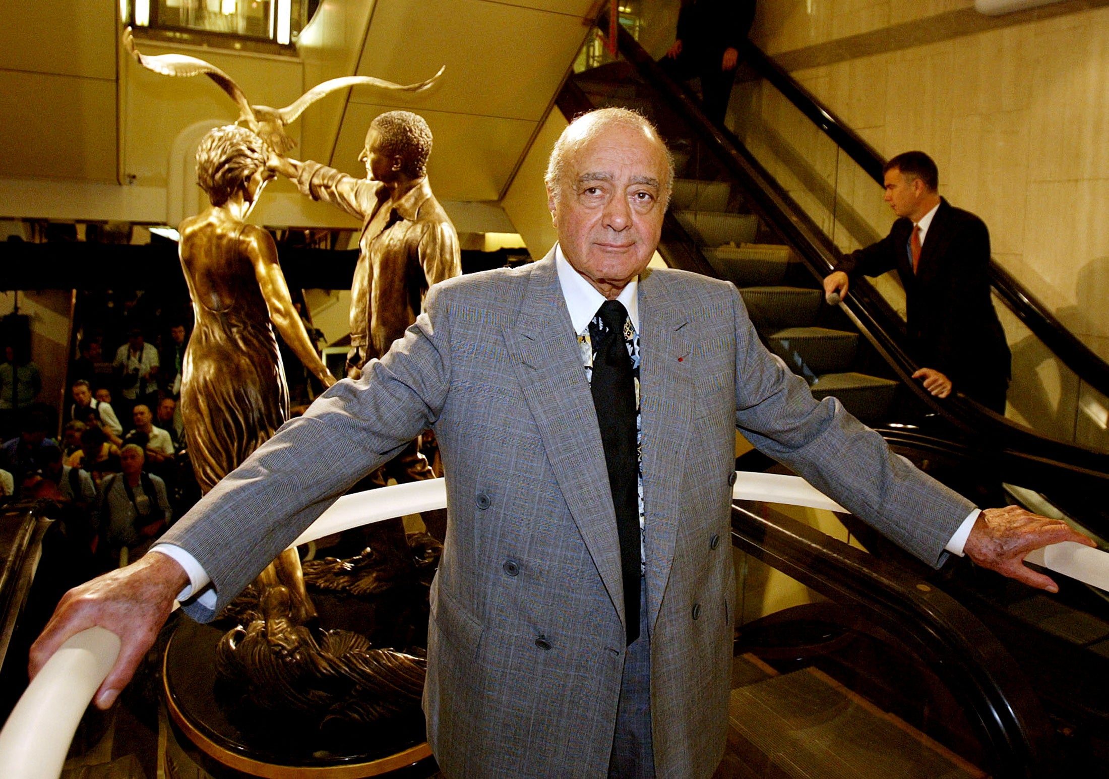 Fayed unveiling a memorial to his son Dodi and Princess Diana in 2005