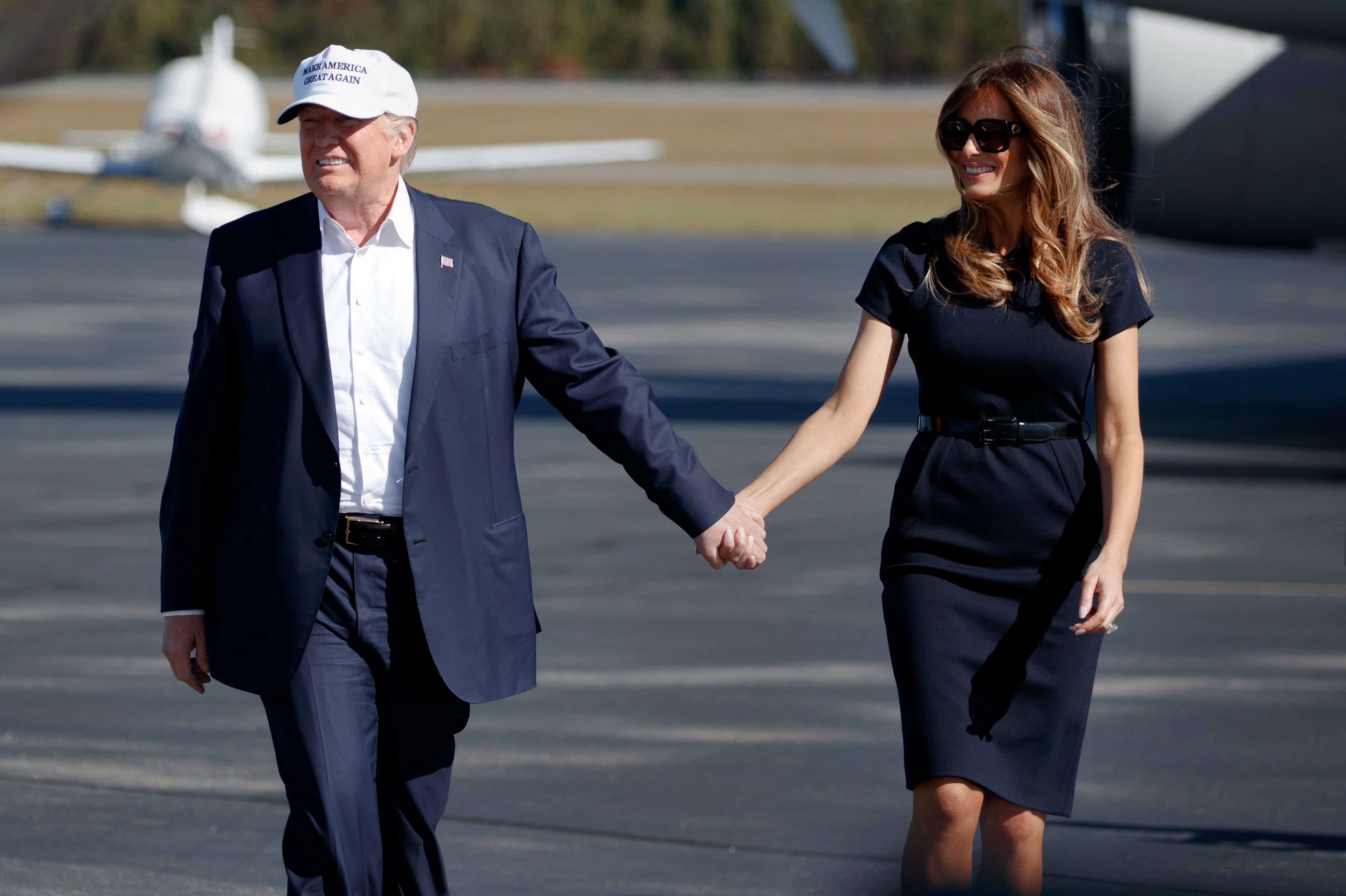 Republican presidential candidate Donald Trump and his wife Melania (who arrived at a campaign rally in Wilmington, North Carolina in 2016) have expressed differing views on reproductive rights