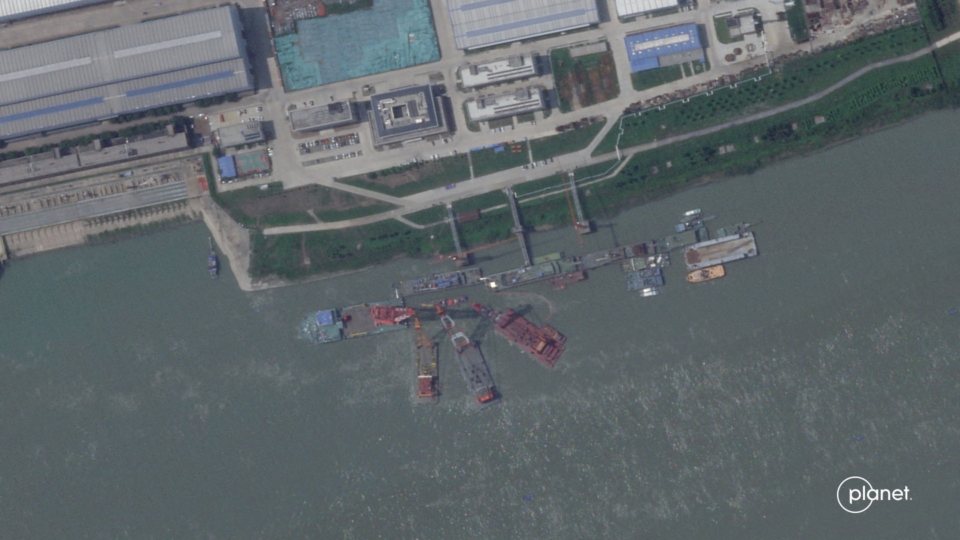 A satellite image from Planet Labs appear to show cranes at the Wuchang shipyard on 15 June 2024