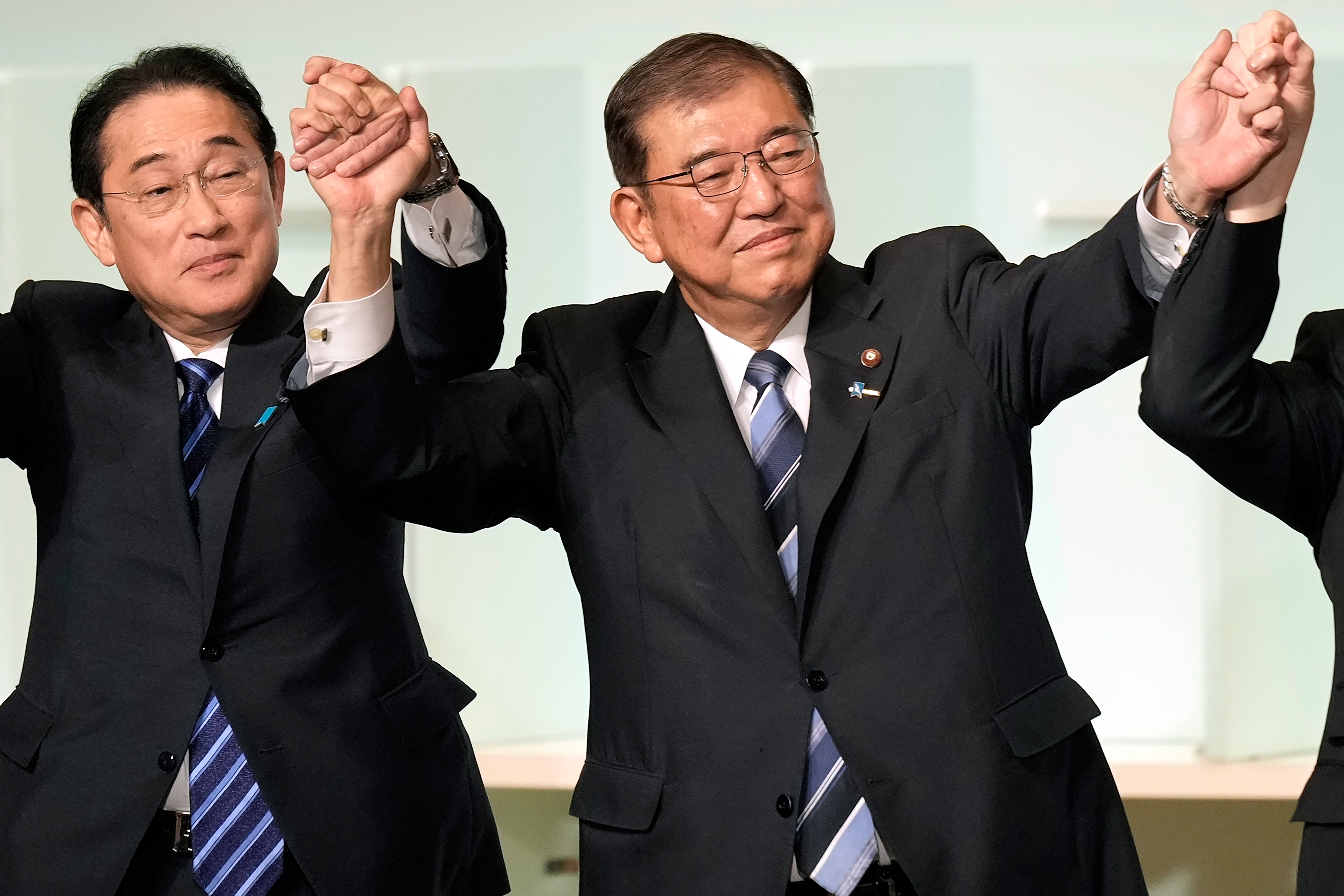 Fumio Kishida, left, resigned arsenic  premier  curate  implicit    the slush money  scandal, adjacent    though   helium  was not straight  implicated, specified  was the reputational harm  to his party