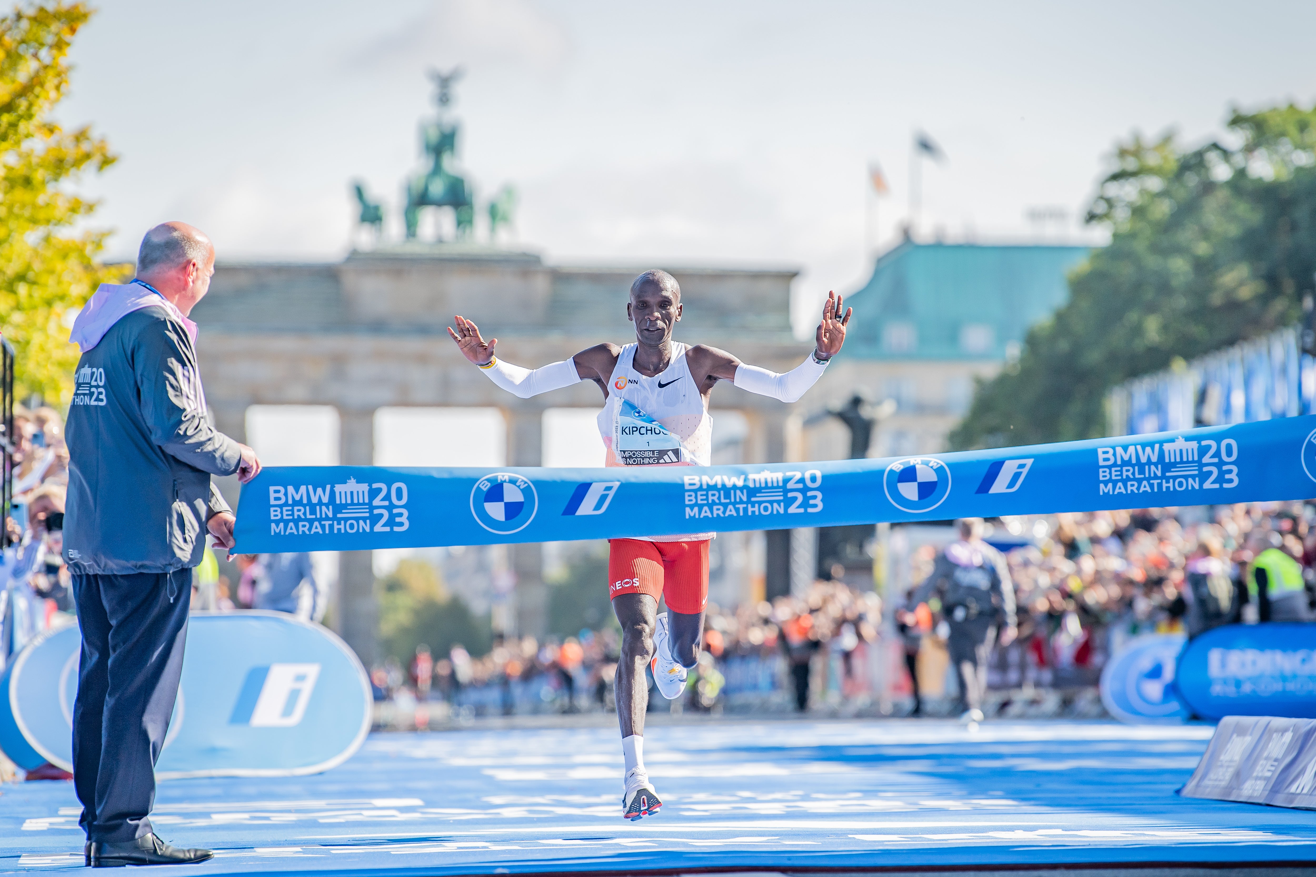 Eliud Kipchoge from Kenya crosses the finish line in first place during the 2023 BMW Berlin-Marathon