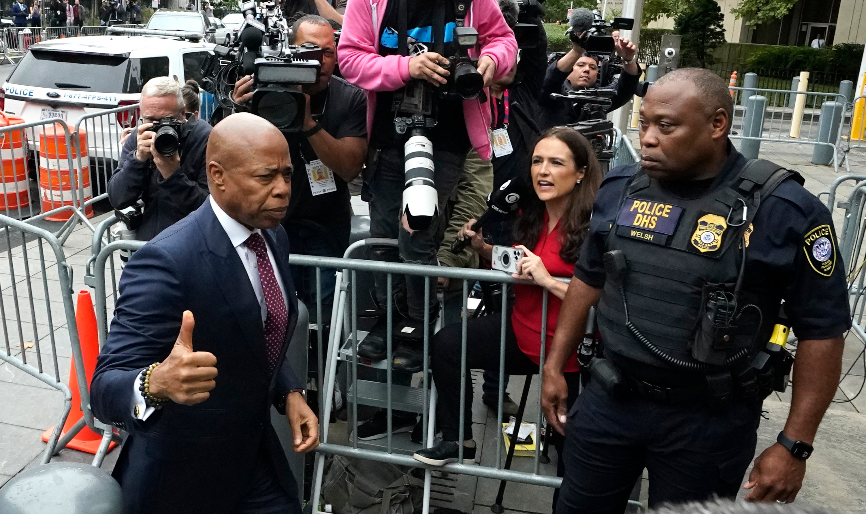 Eric Adams gives a thumbs-up as he arrives at Manhattan federal court on Friday morning