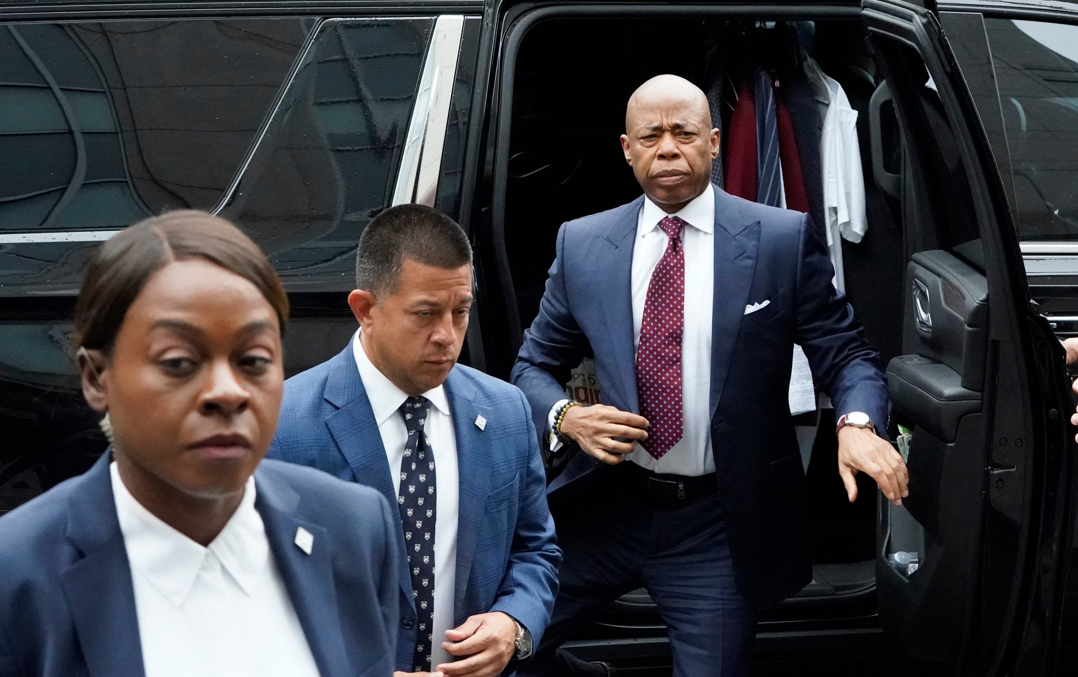 Eric Adams steps out of his car as he arrives at Manhattan federal court on Friday morning