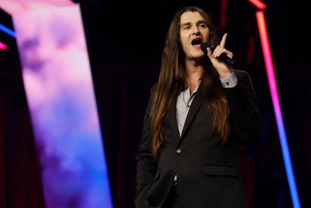 <p>American conservative activist Scott Ryan Presler addresses the conservative Turning Point People's Convention on June 16, 2024 at Huntington Place in Detroit, Michigan</p>