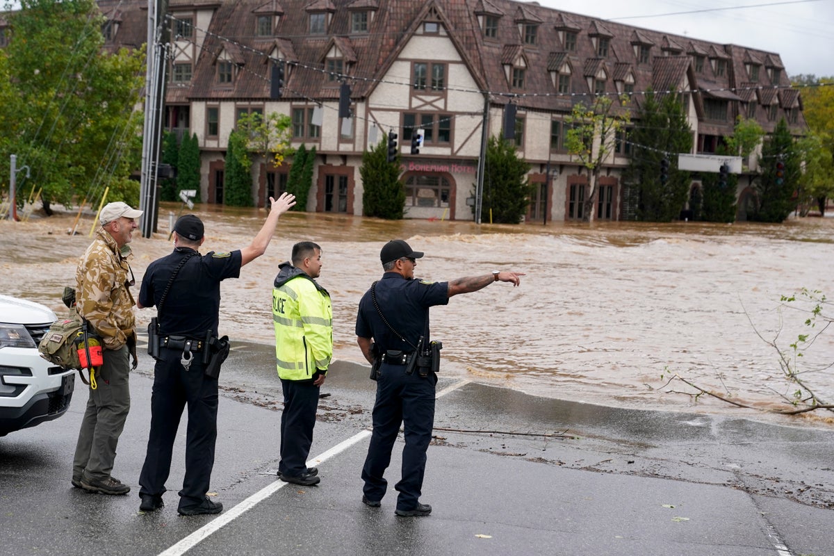 Torrential rains flood North Carolina mountains and…