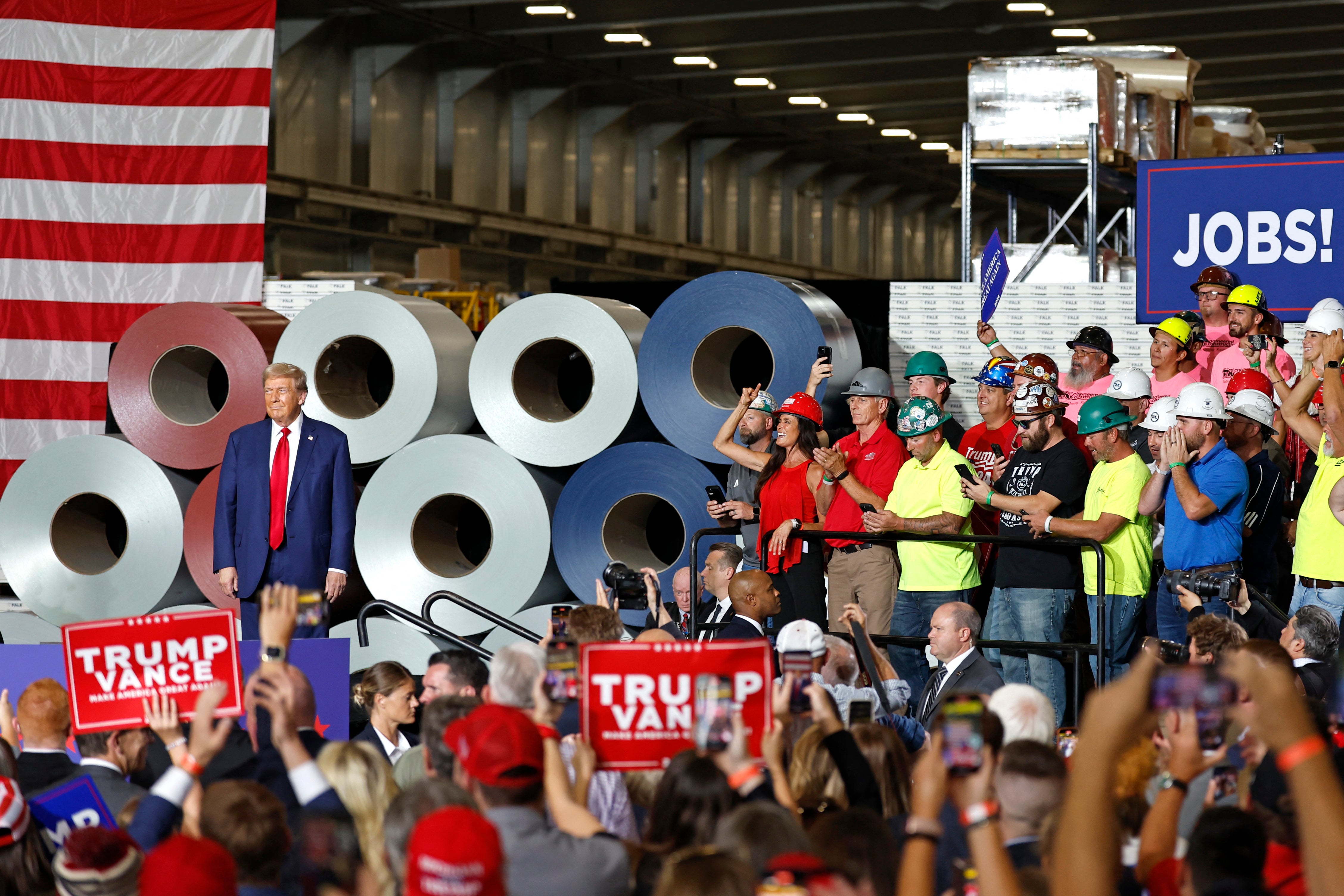 Trump attacked Kamala Harris at the immigration rally just hours before she visited the US-Mexico border