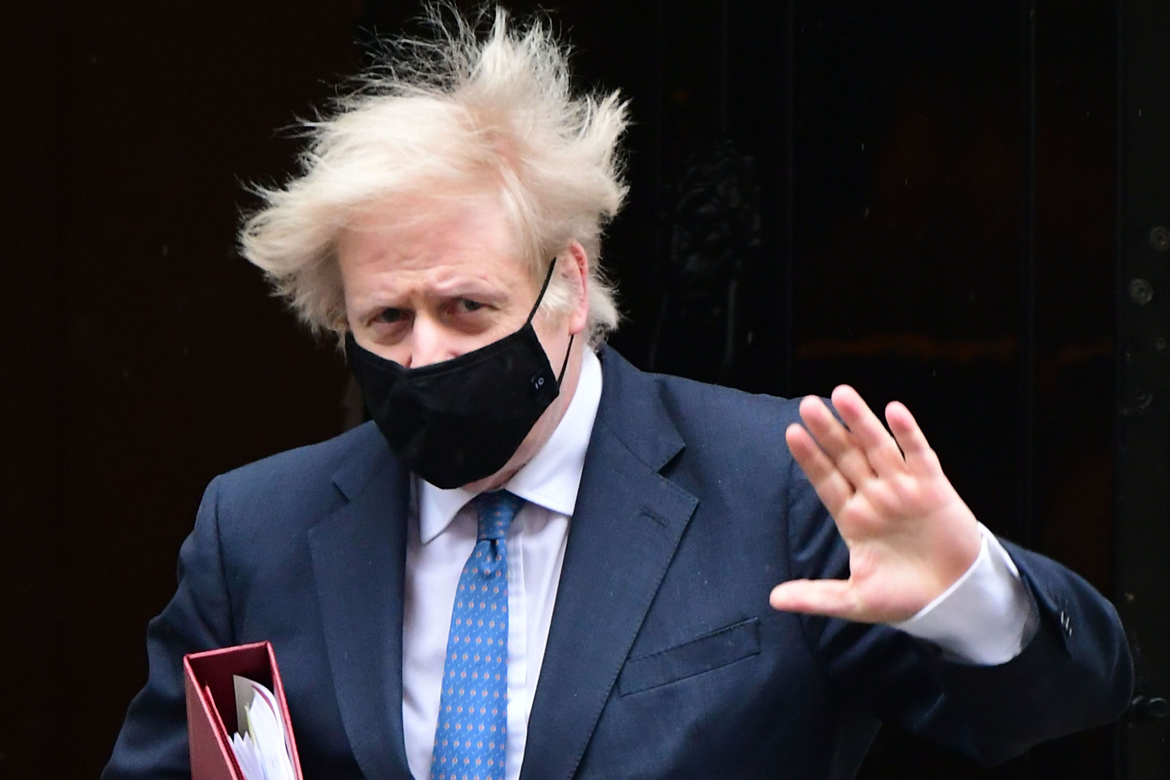 Former prime minister Boris Johnson wearing a mask during Covid lockdowns (PA)