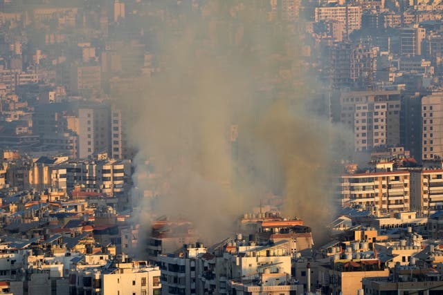 Smoke rises from an Israeli air strike in the southern suburbs of Beirut (Hussein Malla/AP/PA)