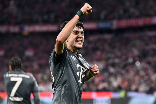 Bayern Munich’s Aleksandar Pavlovic celebrates scoring his side’s equaliser against Bayer Leverkusen (Sven Hoppe/dpa via AP)