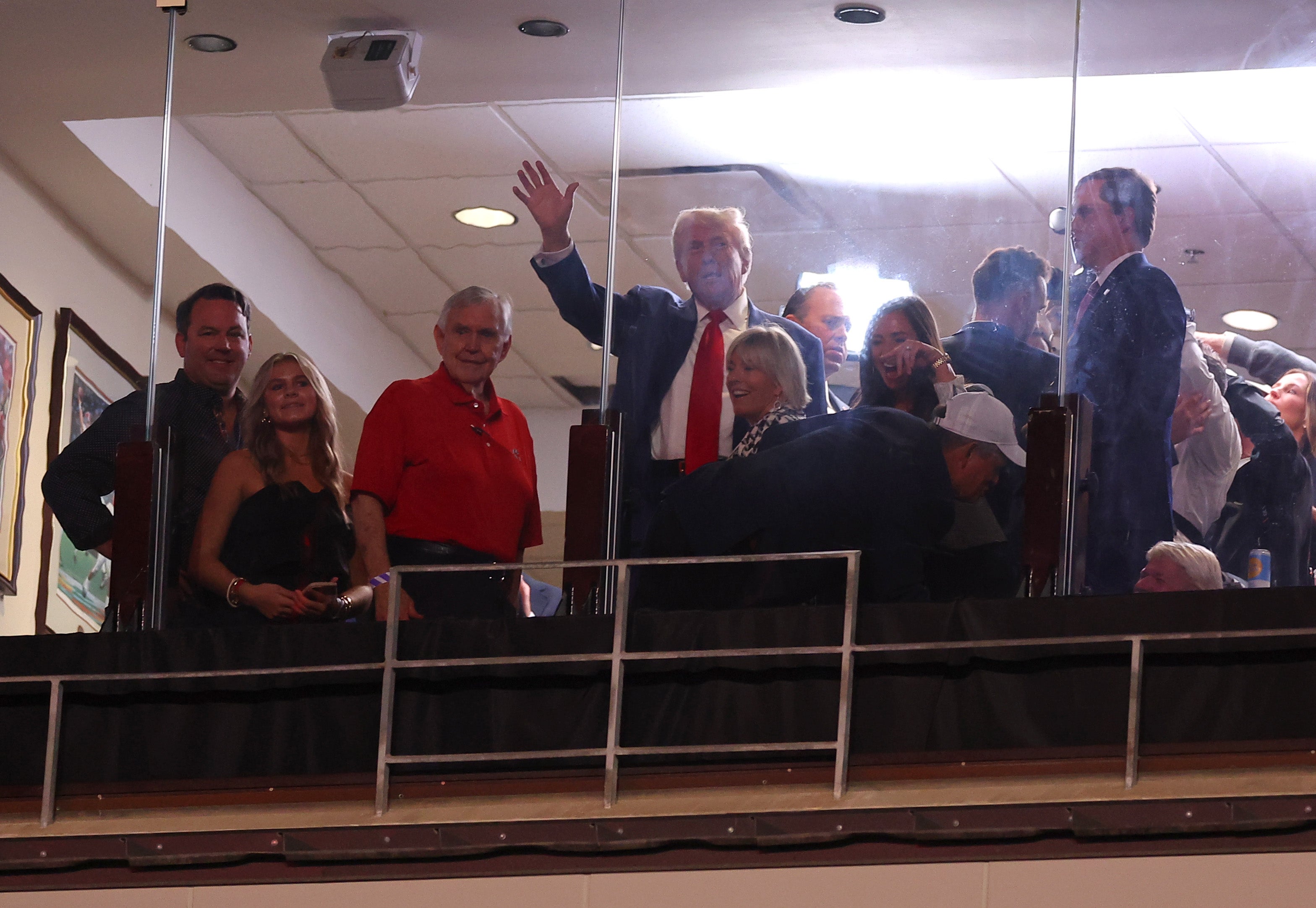 Former President Donald Trump looks on during the first quarter of the game between the Alabama Crimson Tide and the Georgia Bulldogs at Bryant-Denny Stadium in Tuscaloosa