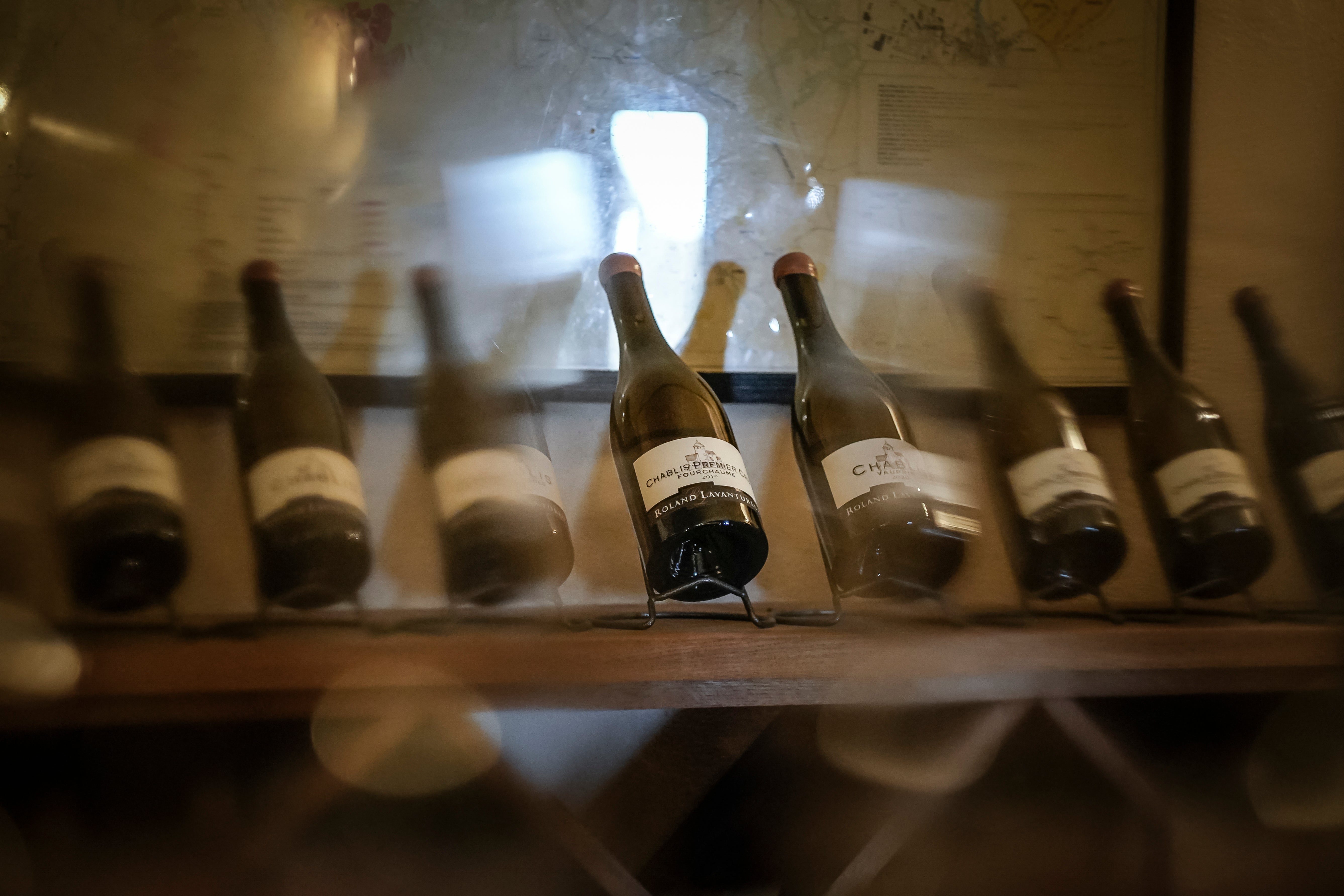 Bottles of Chablis white wine on display at Domaine Lavantureux, in Chablis, Burgundy region