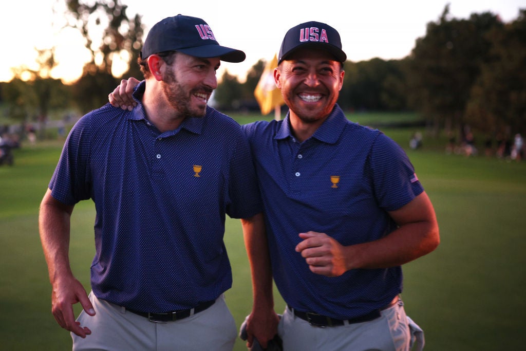 Patrick Cantlay and Xander Schauffele celebrate during the Saturday afternoon Foursomes