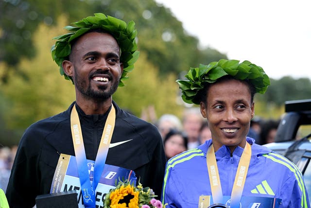 <p>Ethiopia’s Milkesa Mengesha and Tigist Ketema celebrate their wins</p>