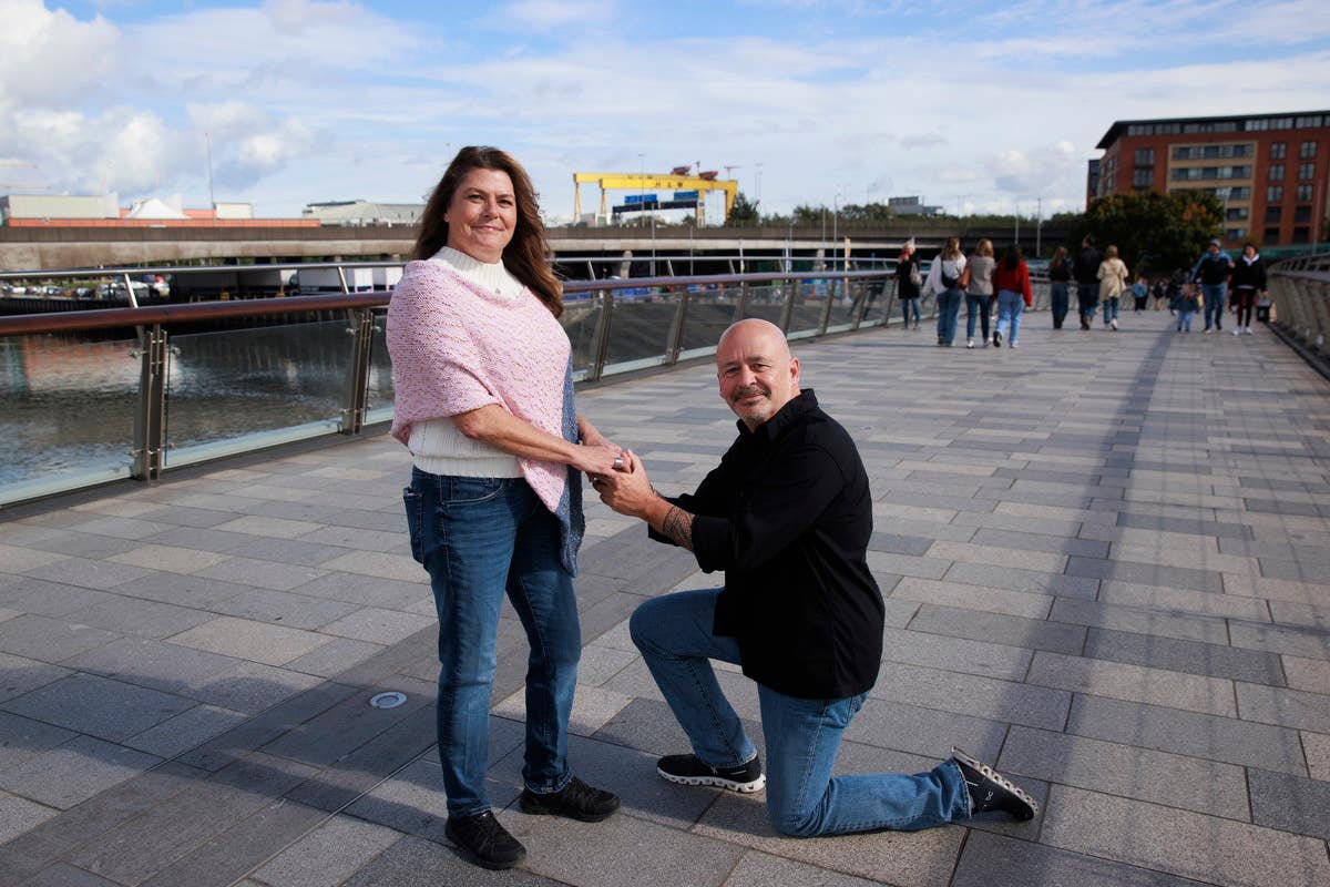 Angela Harsanyi and Gian Perroni who found love with each other after being stuck in Belfast for the last four months amid the delays to the departure of Villa Vie Residences’ Odyssey cruise ship (Liam McBurney/PA)