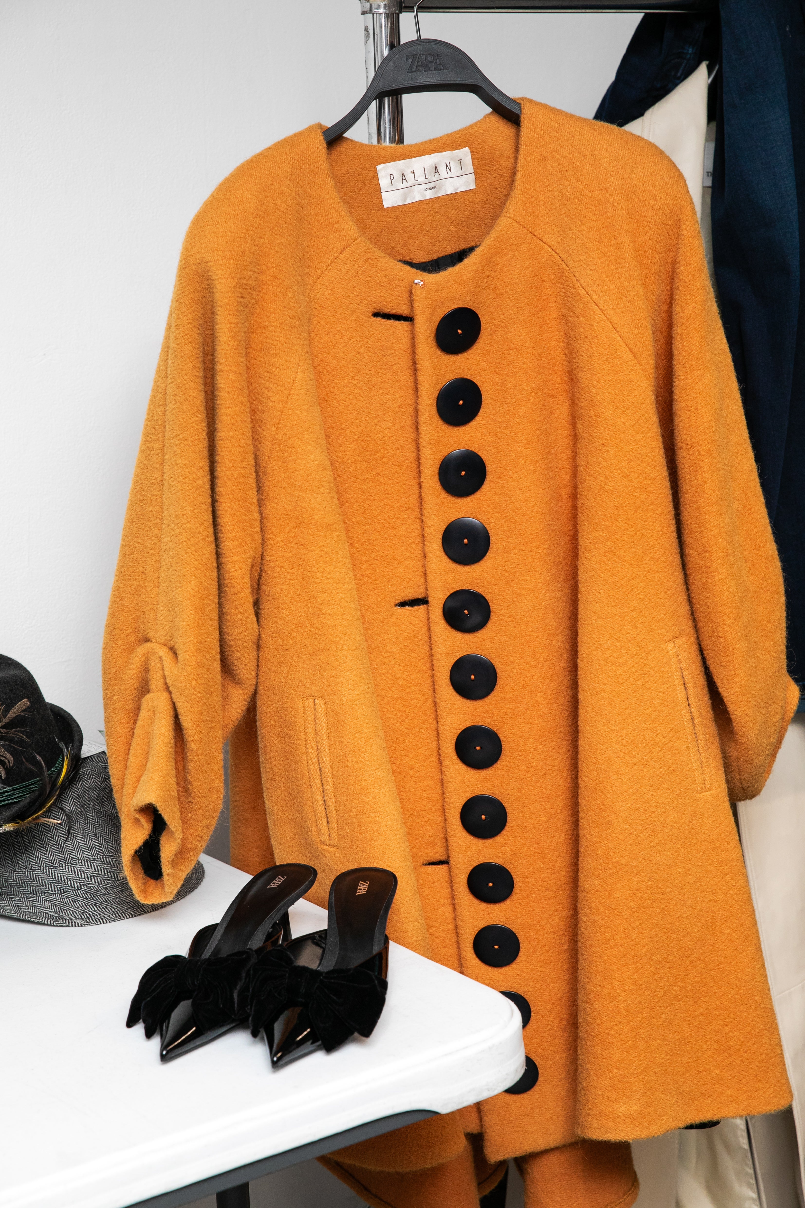 Pallant coat and shoes ready backstage at the Style for Change, Oxfam x Vinted Fashion Show (Gabi Torres/Oxfam/PA)