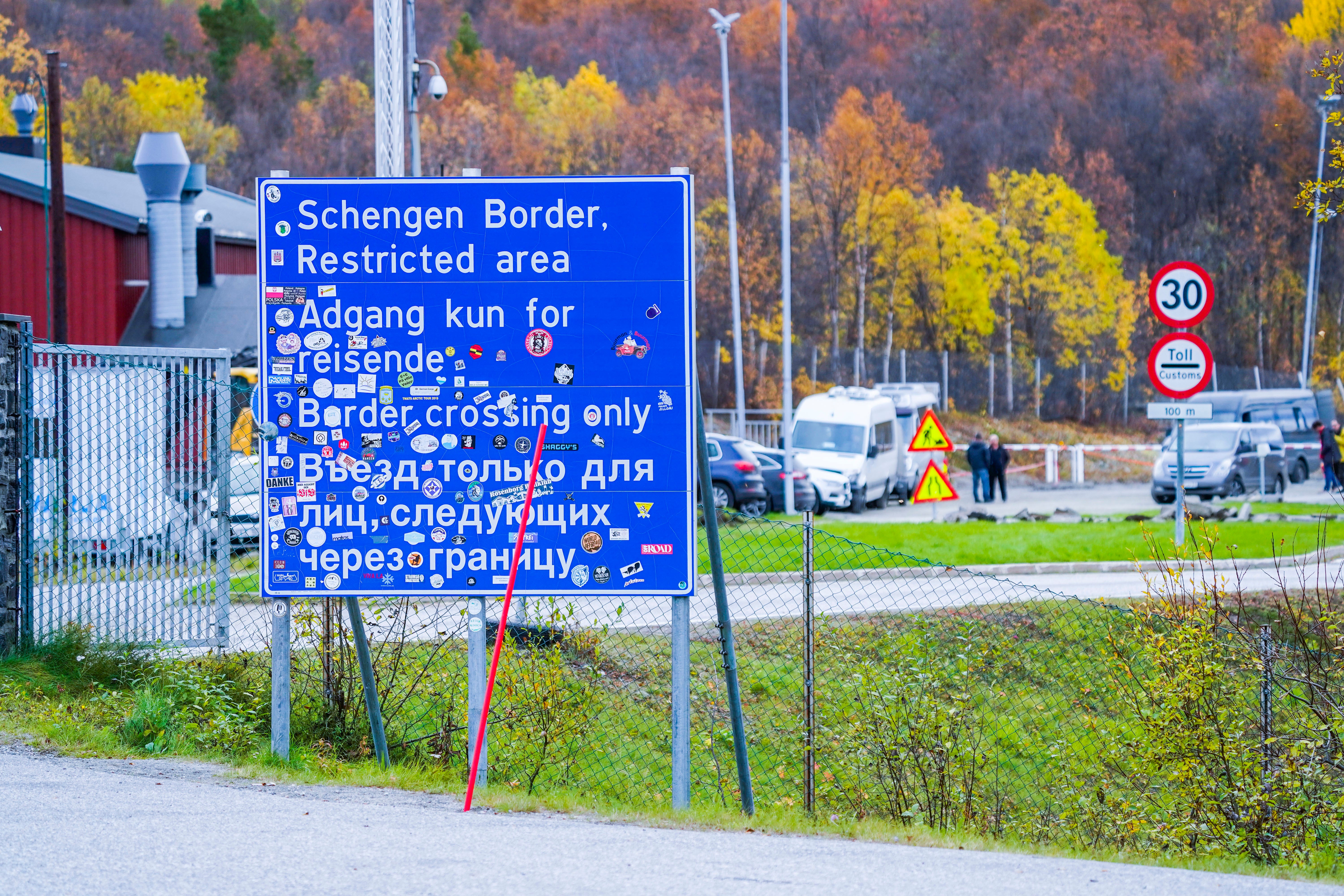 A sign indicating the Storskog border crossing between Russia and Norway is pictured near Kirkenes, Norway