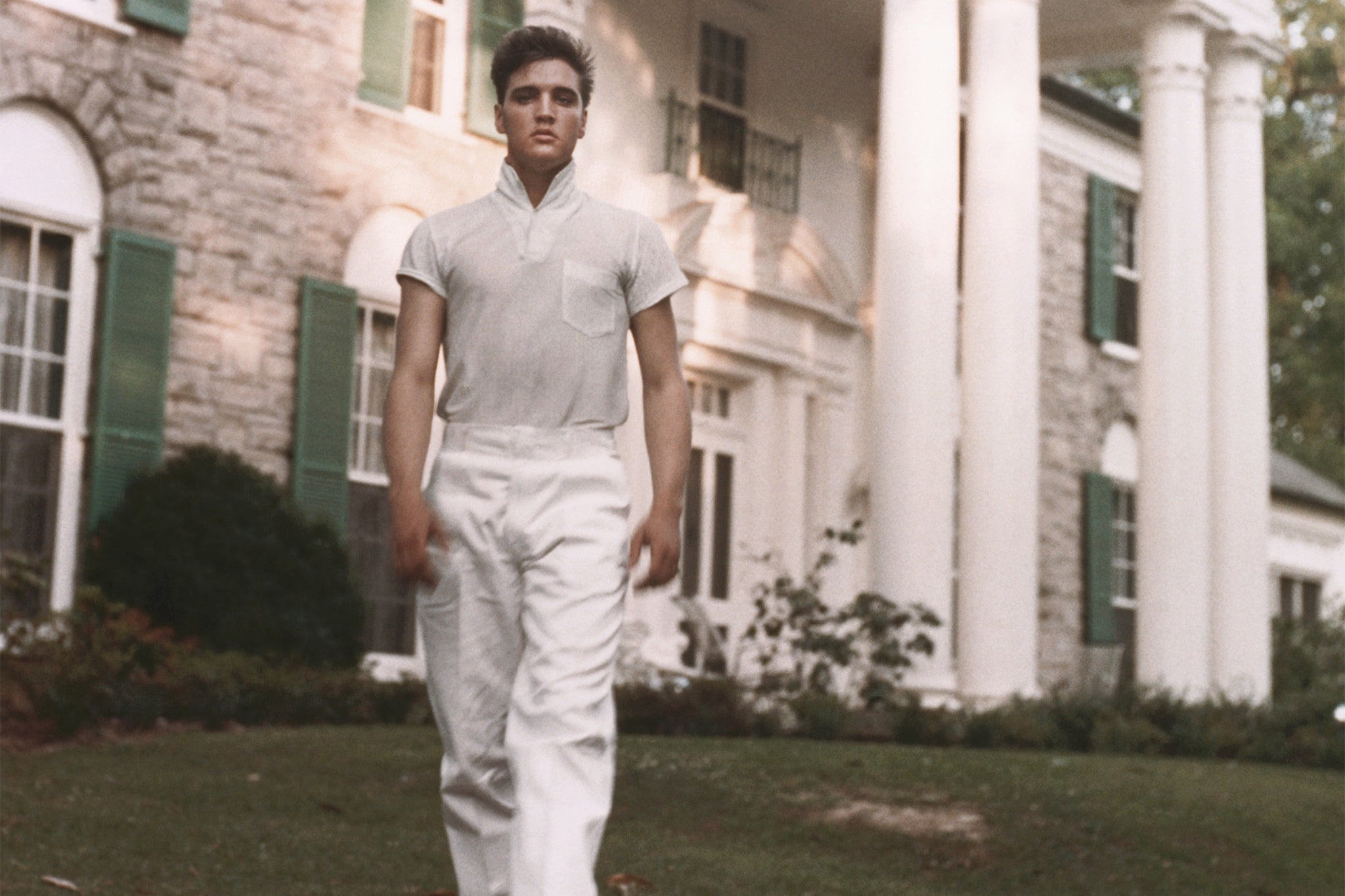 Elvis Presley pictured outside his Graceland mansion, circa 1957