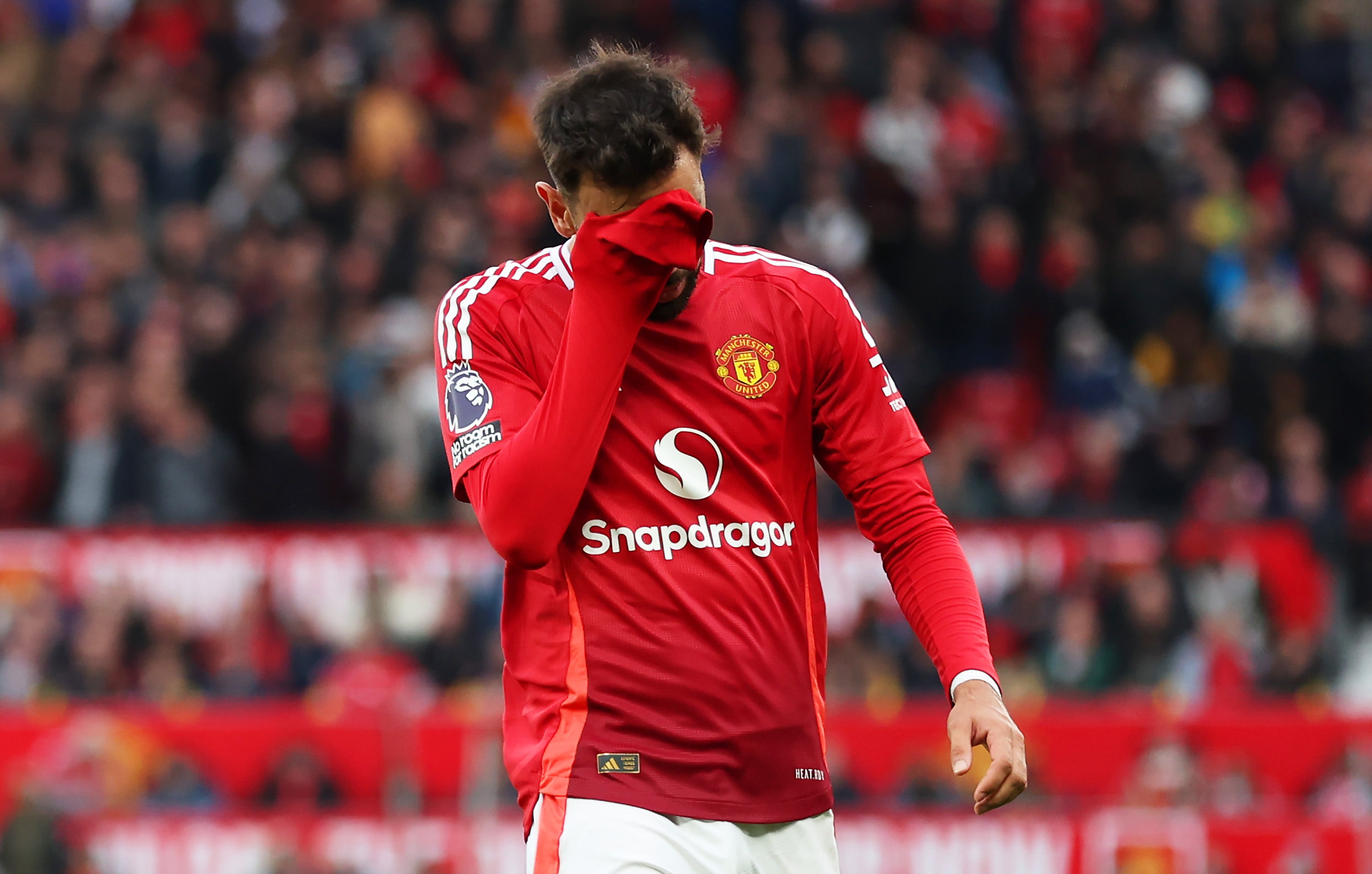 Fernandes leaves the pitch after taking off the captain’s armband