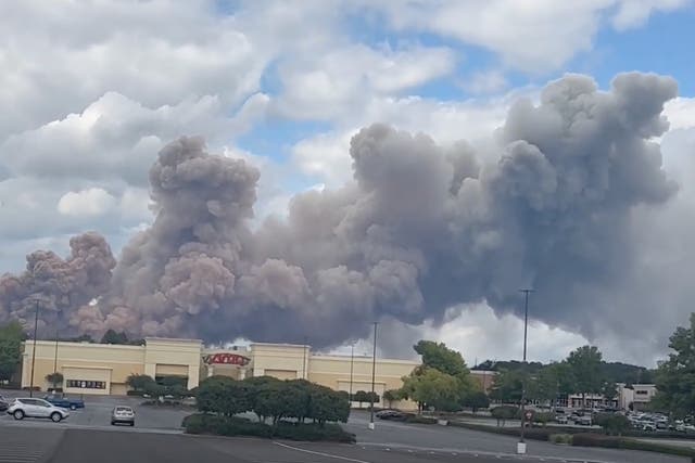 <p>A large smoke plume formed in Conyers, Georgia after a fire at a chemical plant caused a large chemical reaction</p>