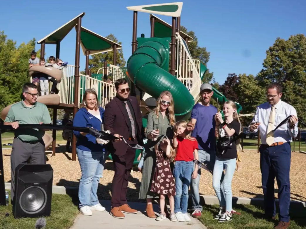 Rosili Olson and her family at the playground’s ribbon-cutting ceremony at Bicentennial Park in Clearfield, Utah