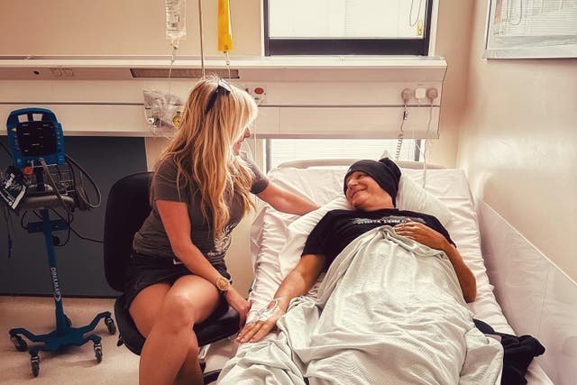 Jules Peters with Mike Peters receiving chemotherapy at The Christie (Jules Peters/PA)