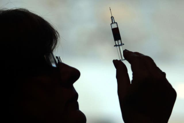 Health officials have raised concerns over a drop in the uptake of the flu vaccine (David Cheskin/PA)