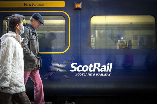 A train drivers’ union has called on the Scottish Government to ‘think again’ over its decision to restore peak time fares on Scotland’s railways (Jane Barlow/PA)