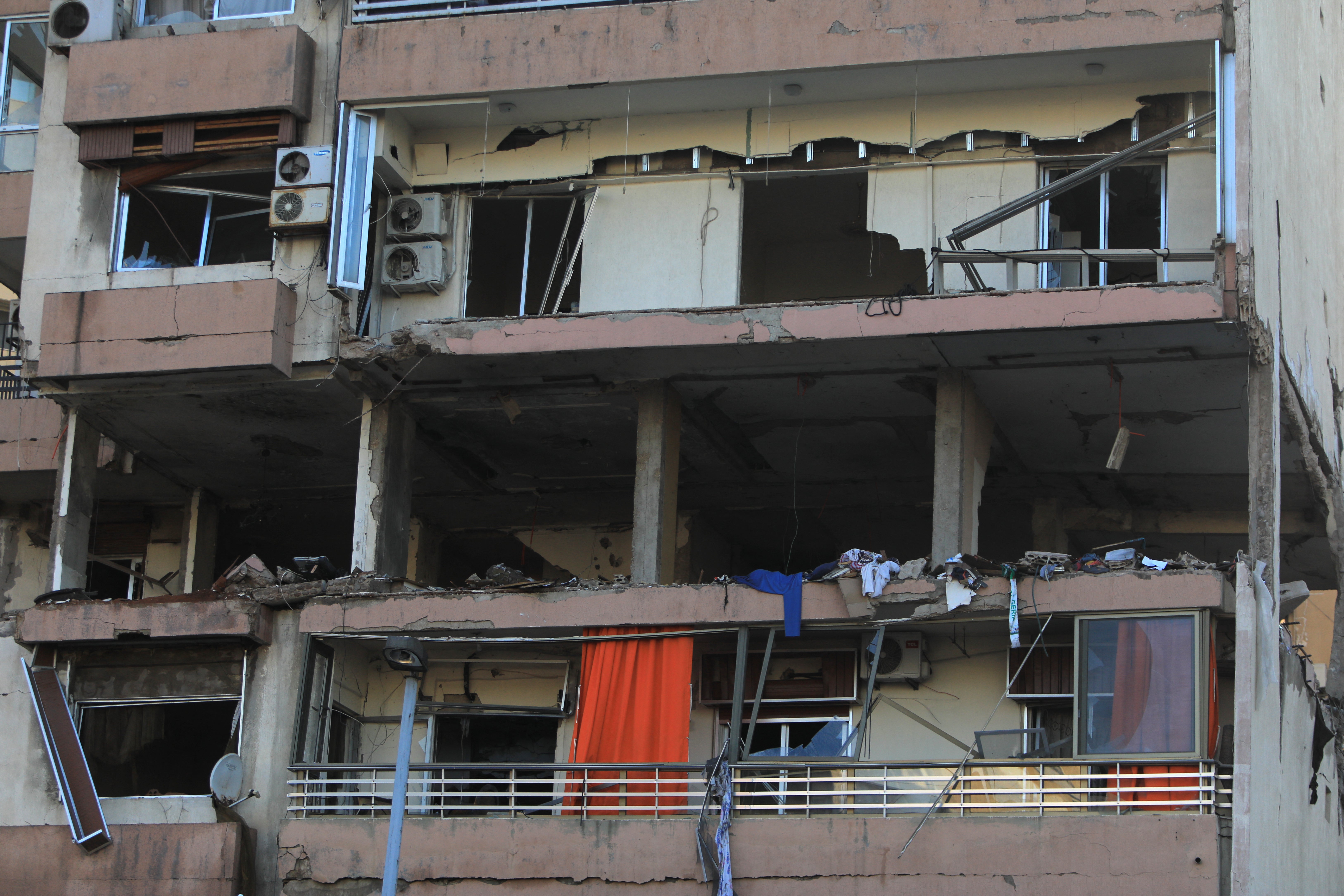 A picture shows the damaged floor in an apartment building that was hit by an Israeli air strike in Beirut's Cola district on September 30, 2024. Israel hit a Beirut apartment block on September 30, killing three members of a Palestinian armed group in its first strike on the city centre since the outbreak of the Gaza war last year