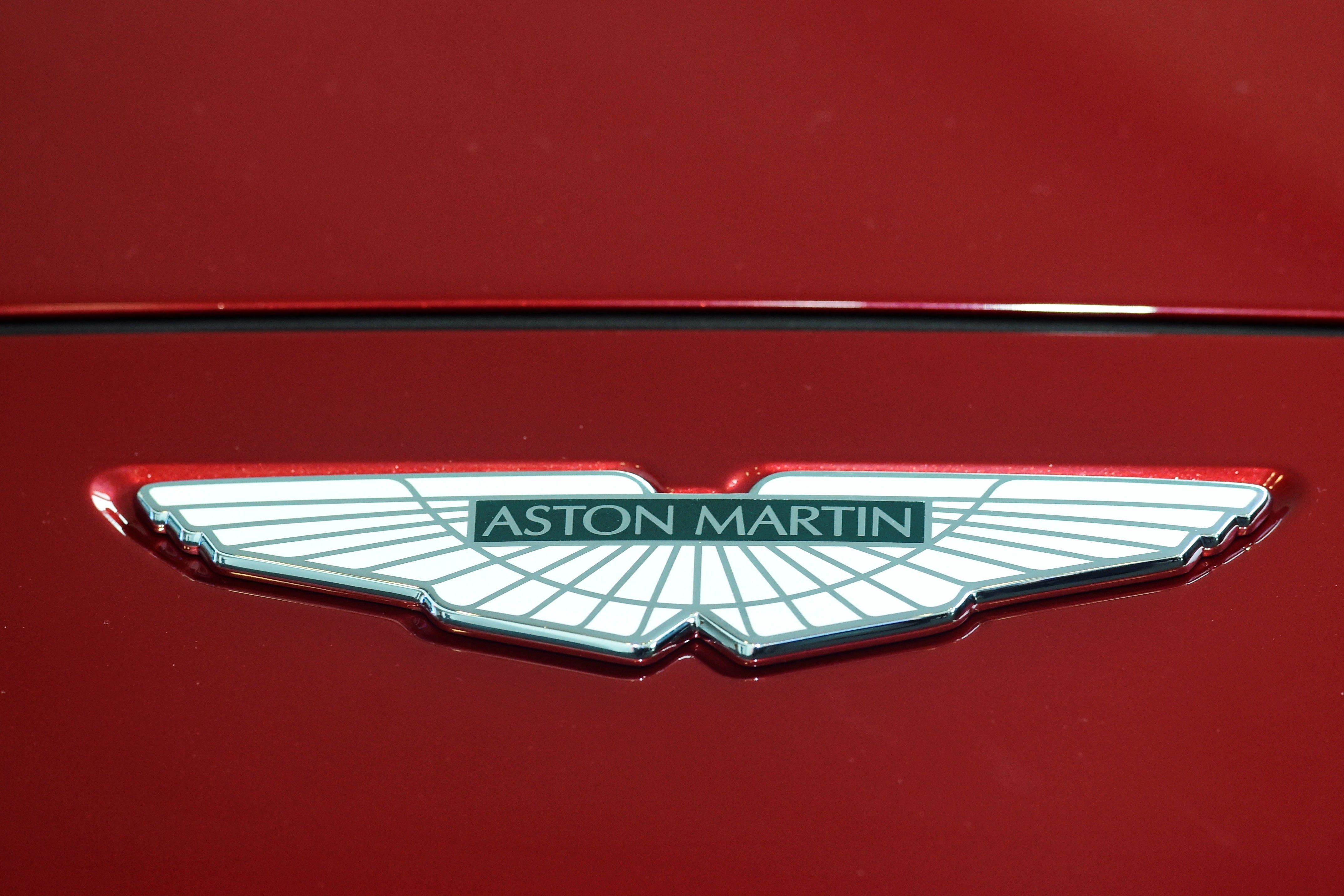 Luxury carmaker Aston Martin has warned over annual earnings and slashed vehicle production for 2024 as it suffers from supplier disruption and weak demand from China (PA)