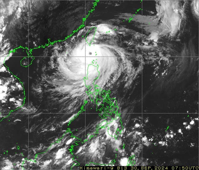 <p>A swirling Typhoon Krathon, with a distinct eye and dense clouds, captured between the Philippines and Taiwan</p>
