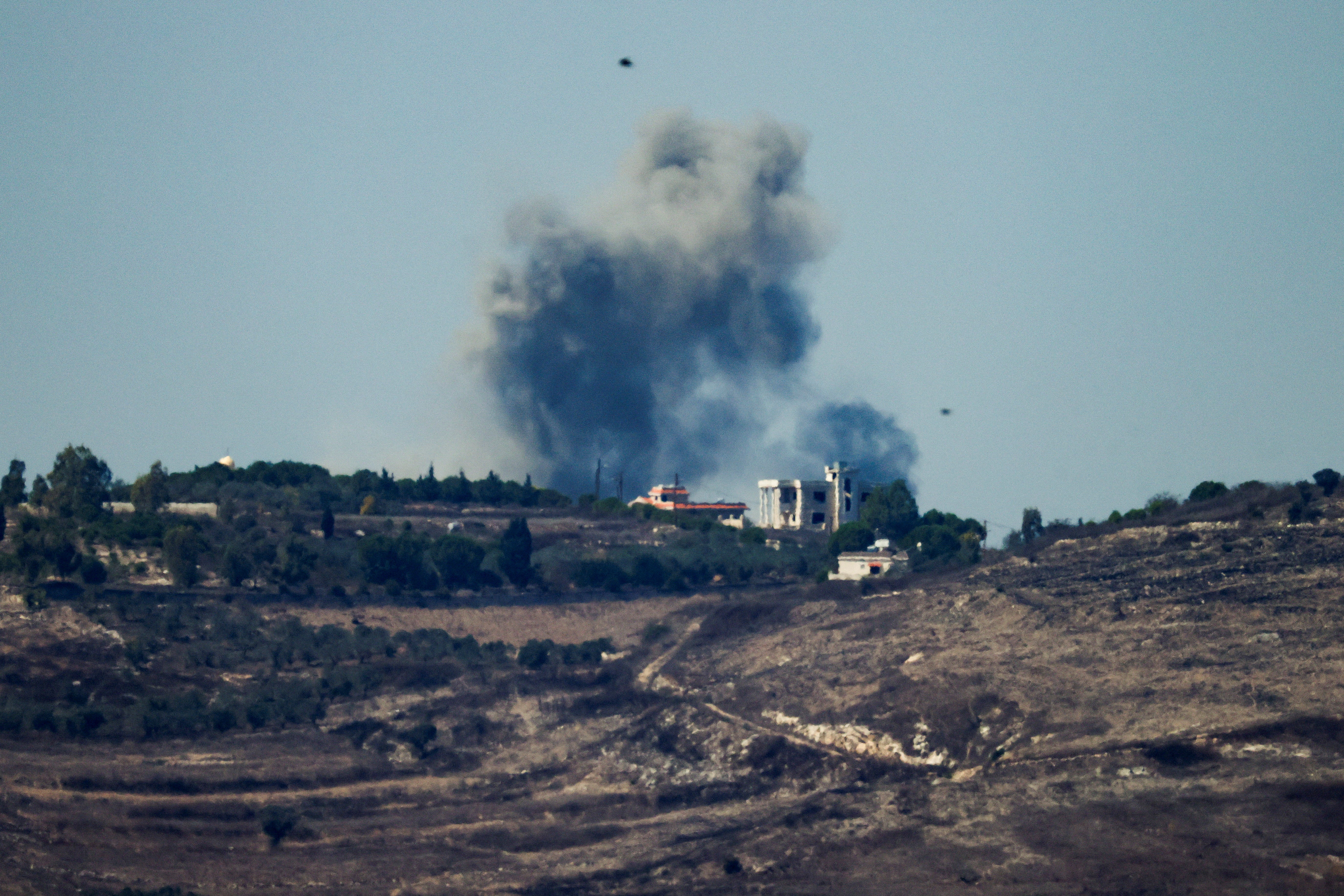 Smoke billows after Israeli Air Force air strikes in southern Lebanon villages, amid cross-border hostilities between Hezbollah and Israel, as seen from northern Israel