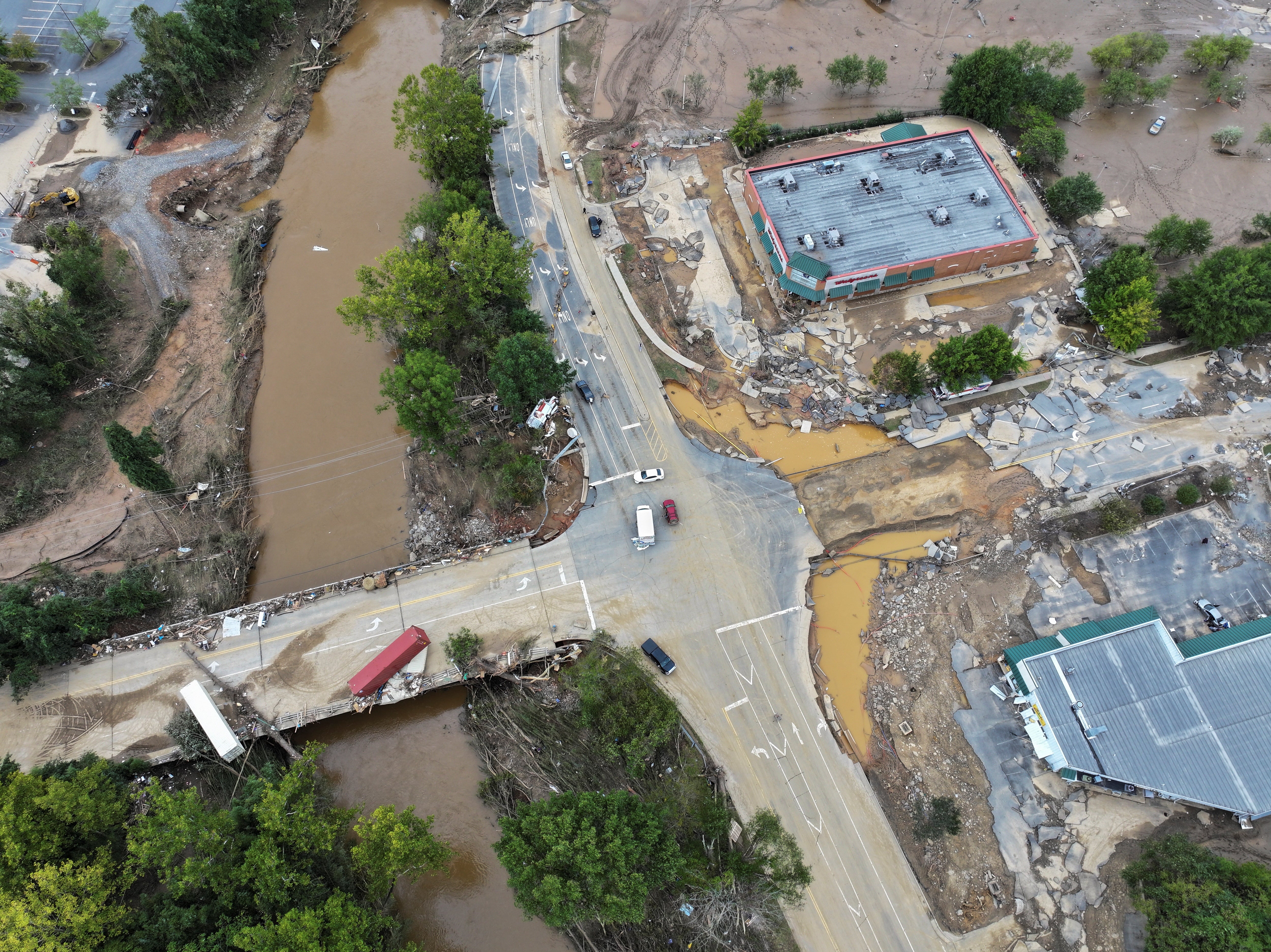 A drone view shows a damaged area in Asheville, North Carolina, on Sunday. Rain was forecast in the area on Monday.