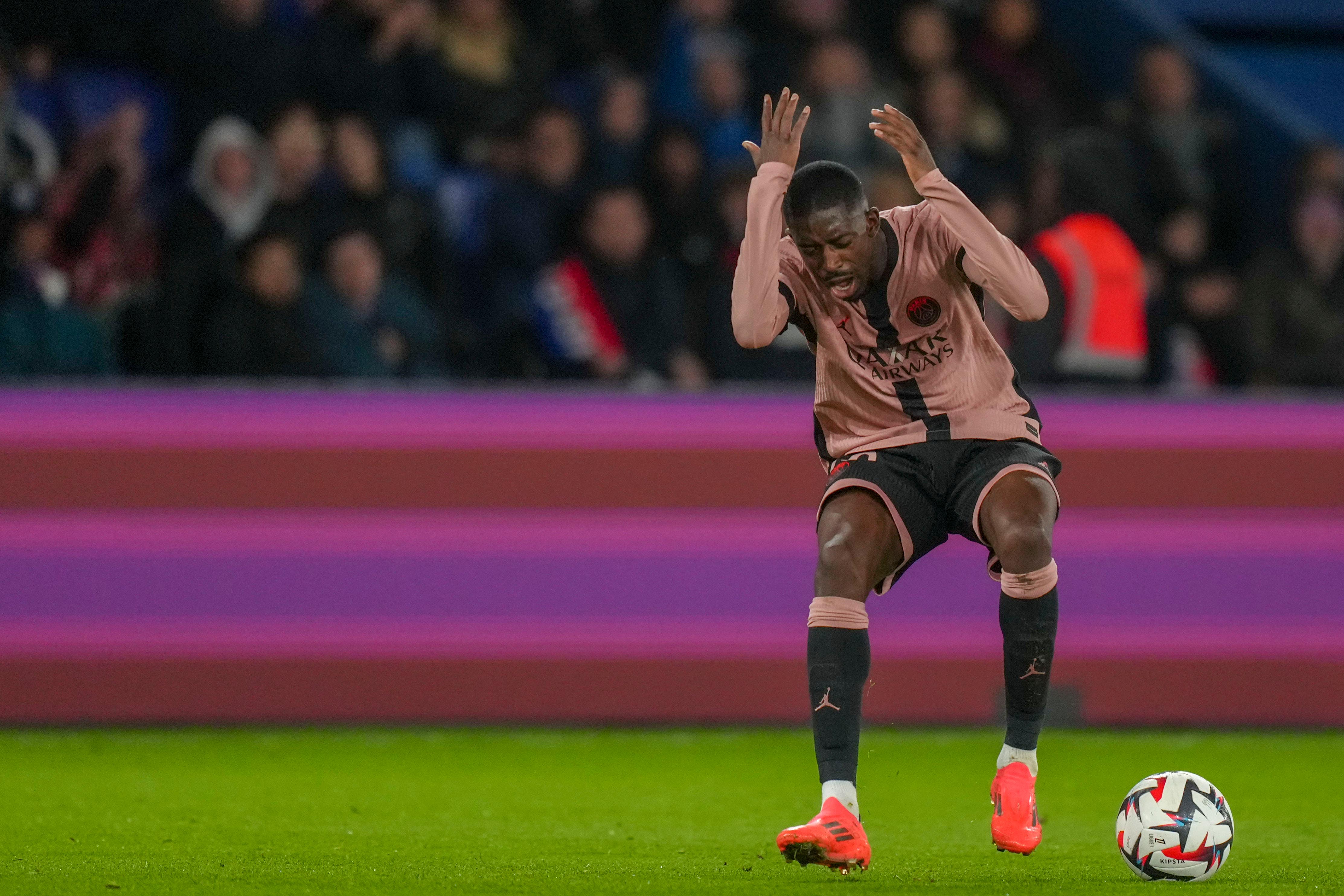 Ousmane Dembele reacts during the match against Rennes (Thibault Camus/AP)