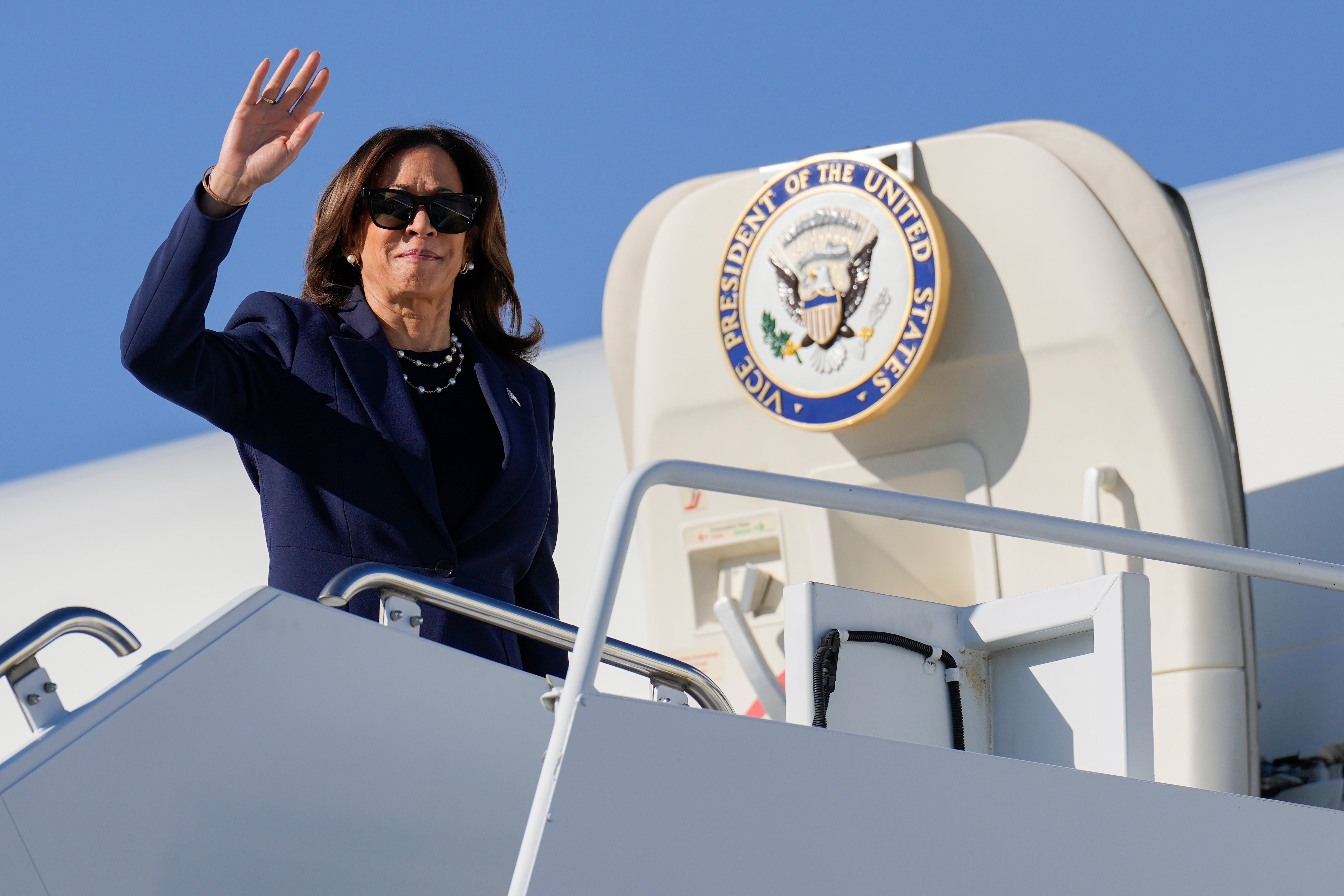 Democratic presidential candidate Vice President Kamala Harris boards Air Force Two in Las Vegas on Monday, Sept. 30, 2024, en route to Washington.