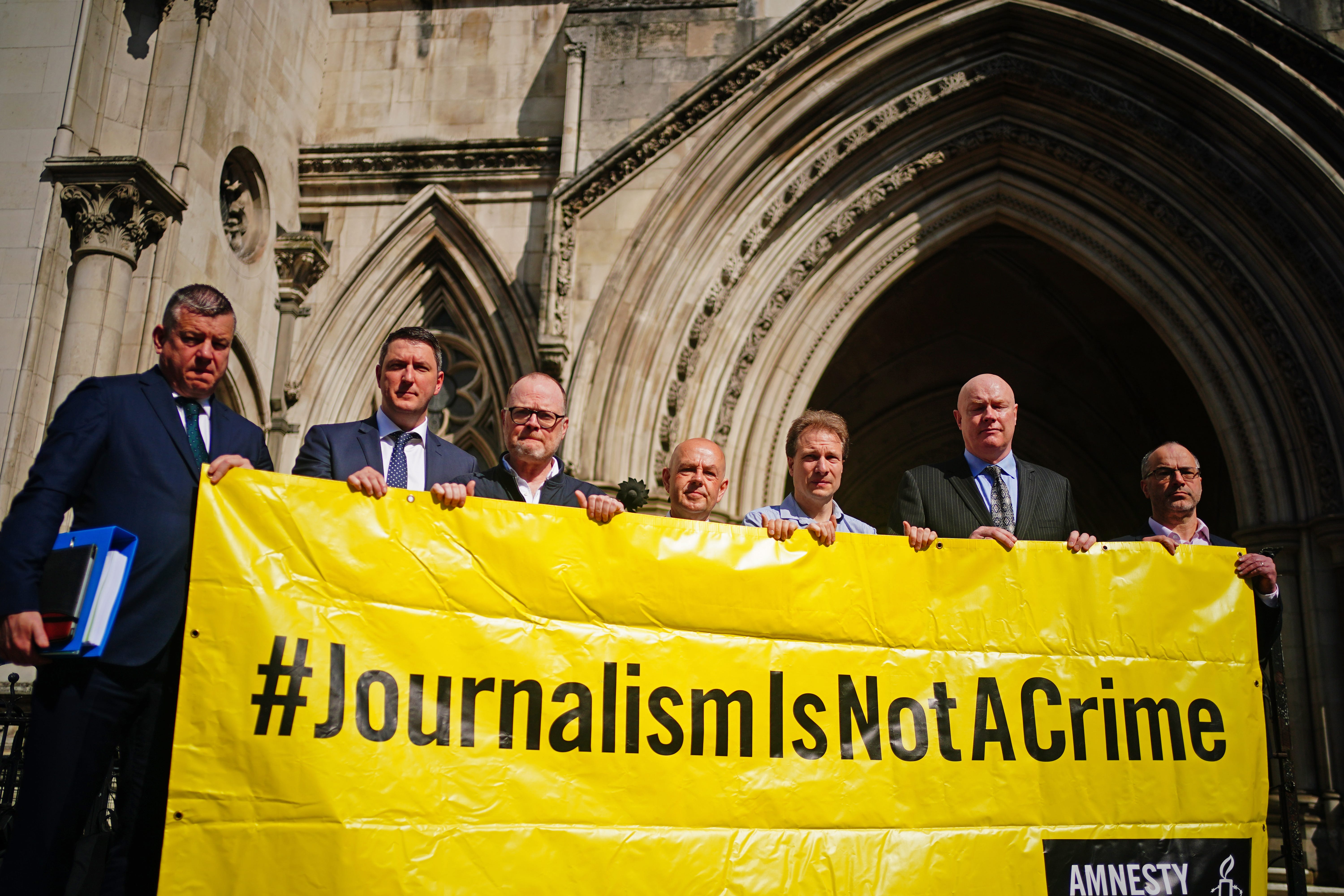 Supporters of journalists Barry McCaffrey and Trevor Birney, outside the Royal Courts of Justice (PA)