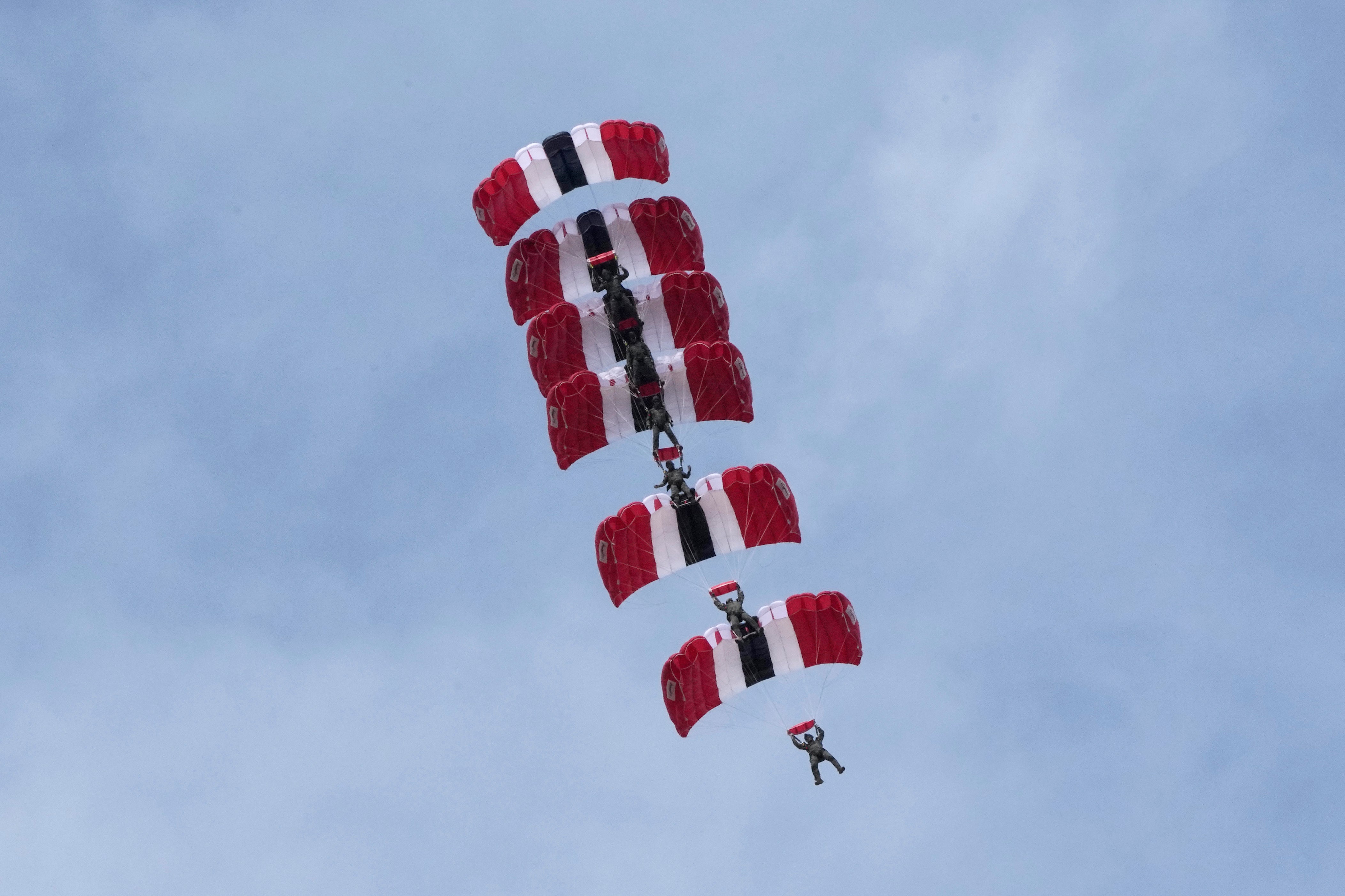 South Korean special army soldiers parachute down during the media day for the 76th anniversary of Armed Forces Da