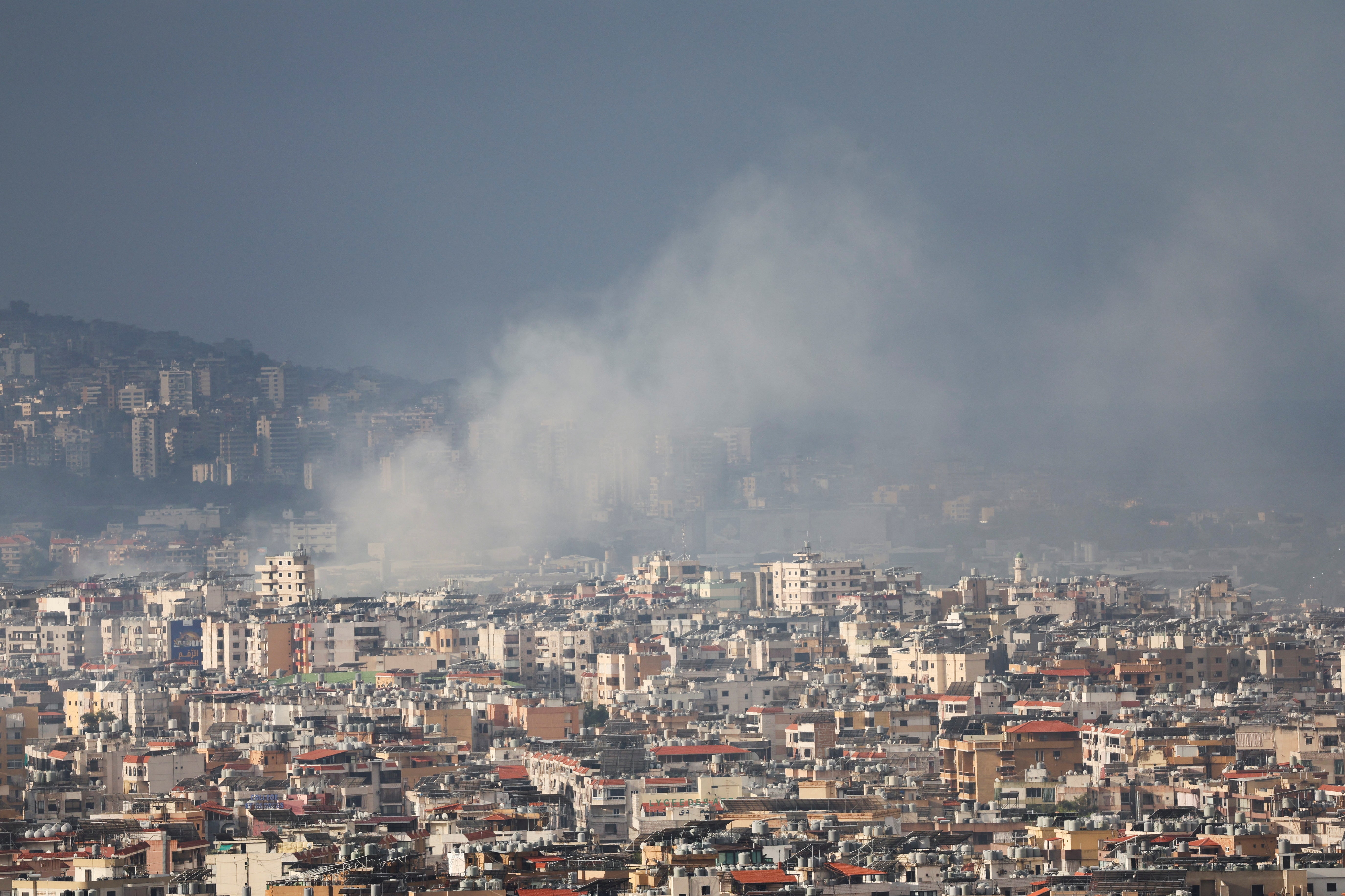 Smoke rises over Beirut's southern suburbs after a strike, amid the ongoing hostilities between Hezbollah and Israeli forces, as seen from Sin El Fil, Lebanon,