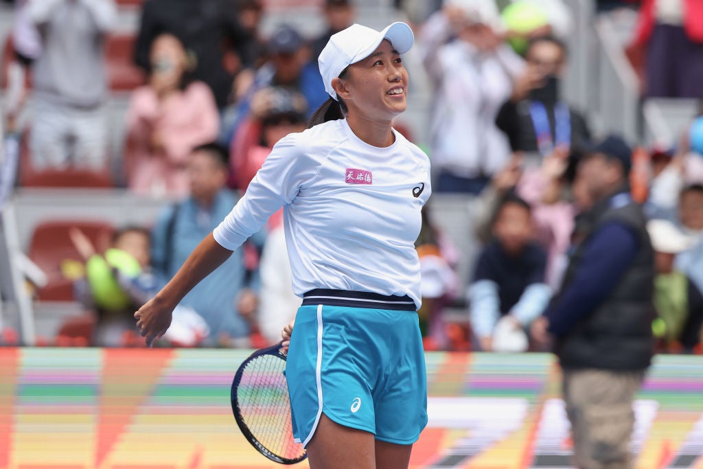 Zhang Shuai celebrates reaching the quarter-finals of the China Open after beating Magdalena Frech