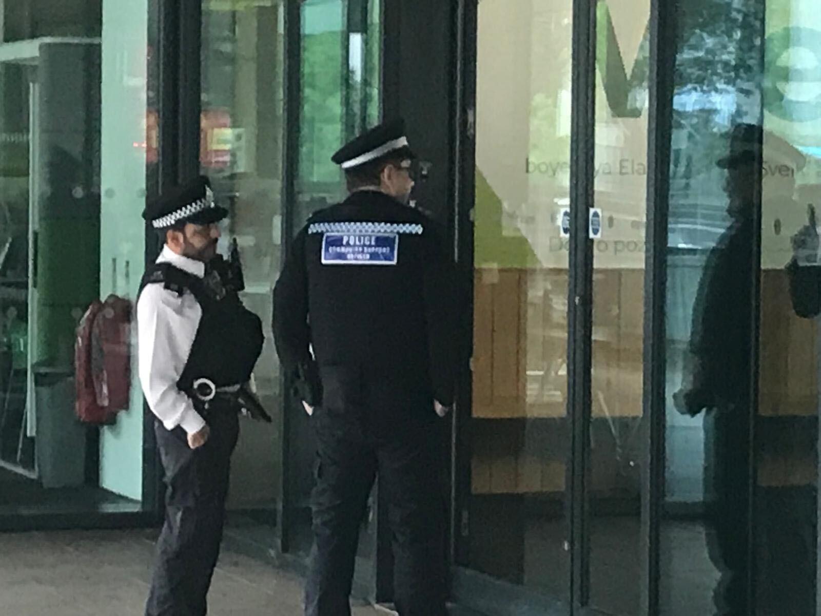 Police patrol outside the academy