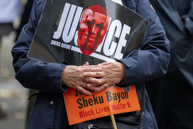 Supporters of Skehu Bayoh outside Capital House in Edinburgh for the inquiry (Jane Barlow/PA)