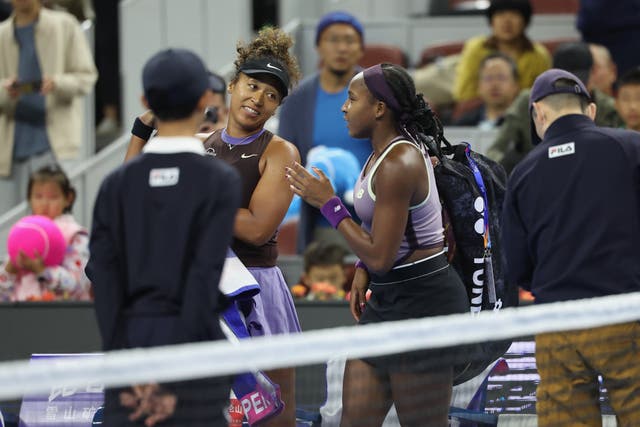 <p>Gauff speaks with Osaka after her sudden retirement from the match  </p>