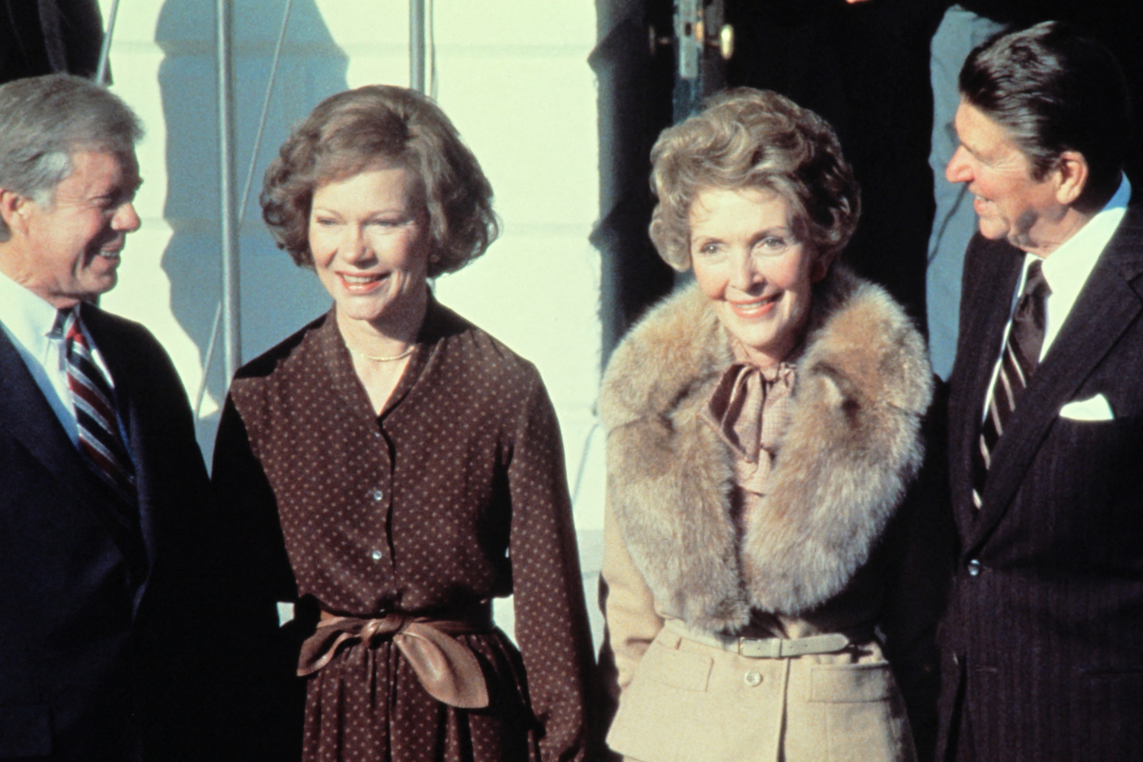 Jimmy Carter (left) and Rosalynn Carter greet Ronald Reagan (right) and Nancy Reagan at the White House in 1980